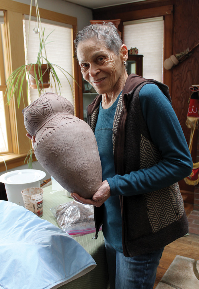 below Wampanoag artist Nosapocket/Ramona Peters (pictured) created this traditional cooking pot specifically for the Mayflower 400 exhibition.