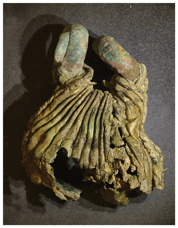 The hoard also included leather and cloth items, including this leather purse shown after conservation (RIGHT) and a fabric bag that was found to contain gold and silver jewellery (below).