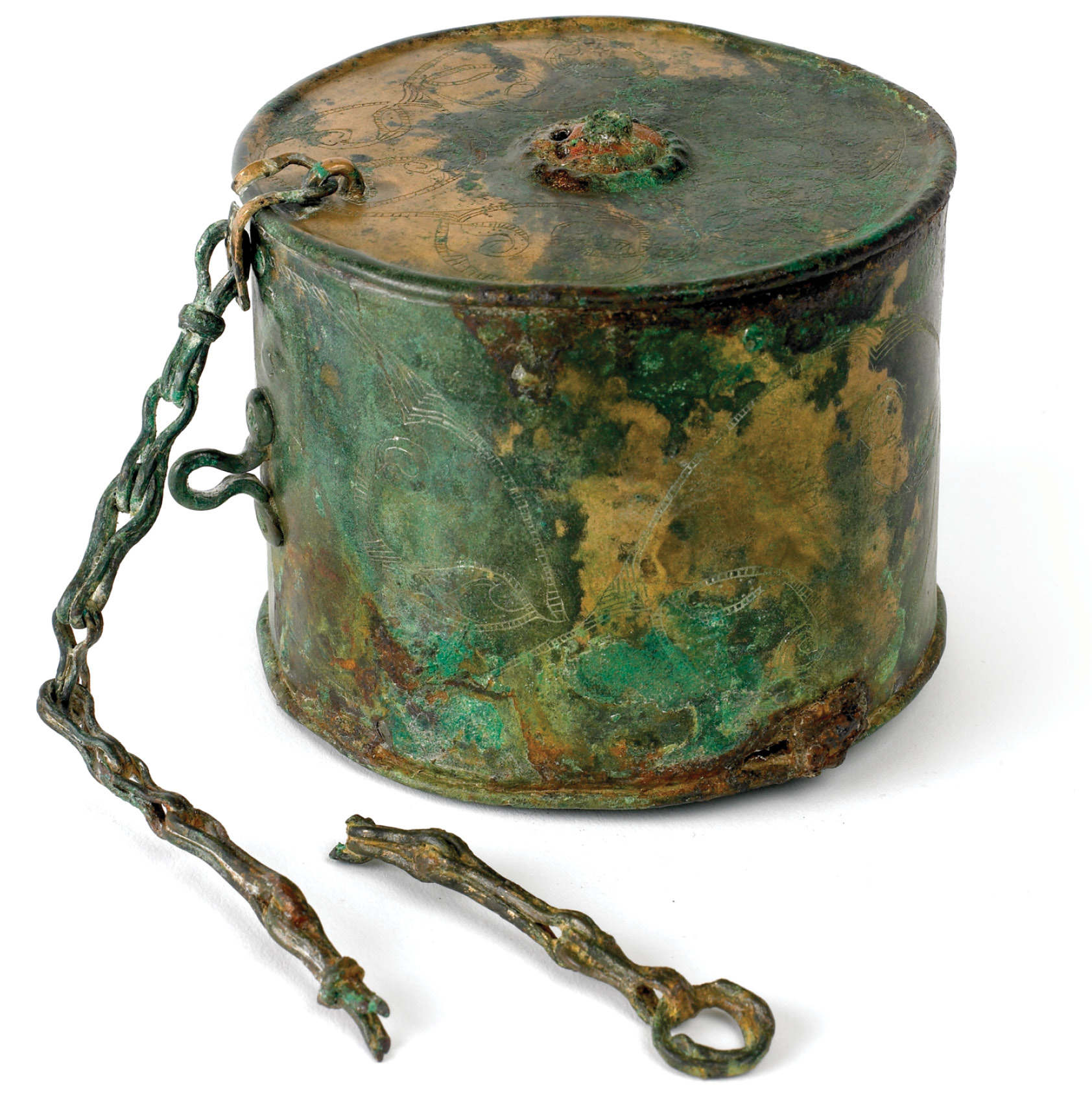 ABOVE RIGHT Among the most remarkable of all grave goods found in Ireland is a bronze cylindrical box which, along with a fibula brooch and 86 stone and glass beads (all unburnt), had been added to a 4th- to 1st -century BC cremation burial at Ballydavis Townland, Co. Laois. The box is nearly identical to the one recovered from Chariot Burial 2 at Wetwang Slack, East Yorkshire. Nothing links the two burials other than the bronze box, which might indicate that the deceased had a trading connection with the source of such objects, in Britain or mainland Europe.