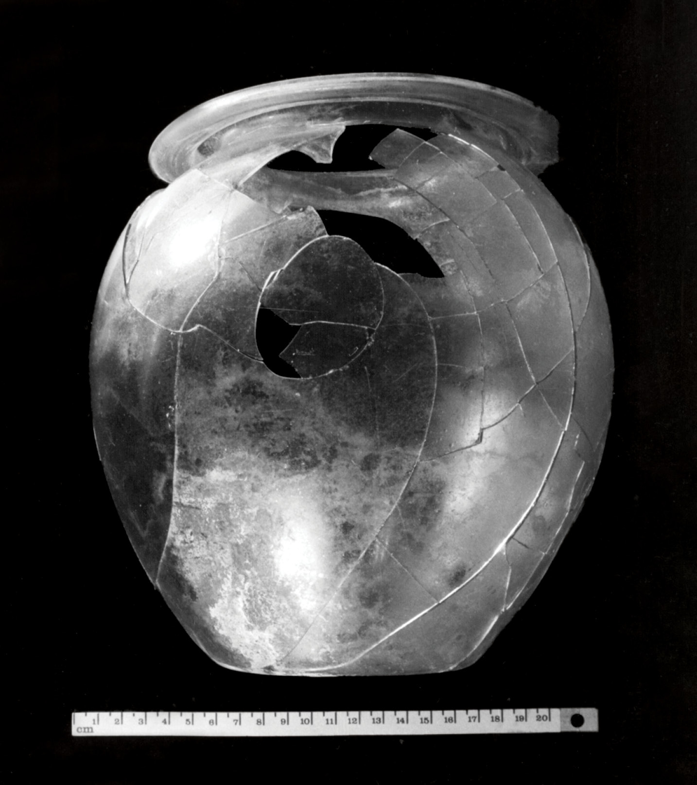 ABOVE A rare example in Ireland of a Romano-British cremation jar, found at Stoneyford, Co. Kildare, in 1852. The jar contained cremated bone and a small glass lachrymatory (a bottle for holding the tears of the mourners). It was covered by a bronze mirror. The burial site, above a navigable river leading to the sea at Waterford, suggests that the deceased was involved in trade with Roman Britain.
