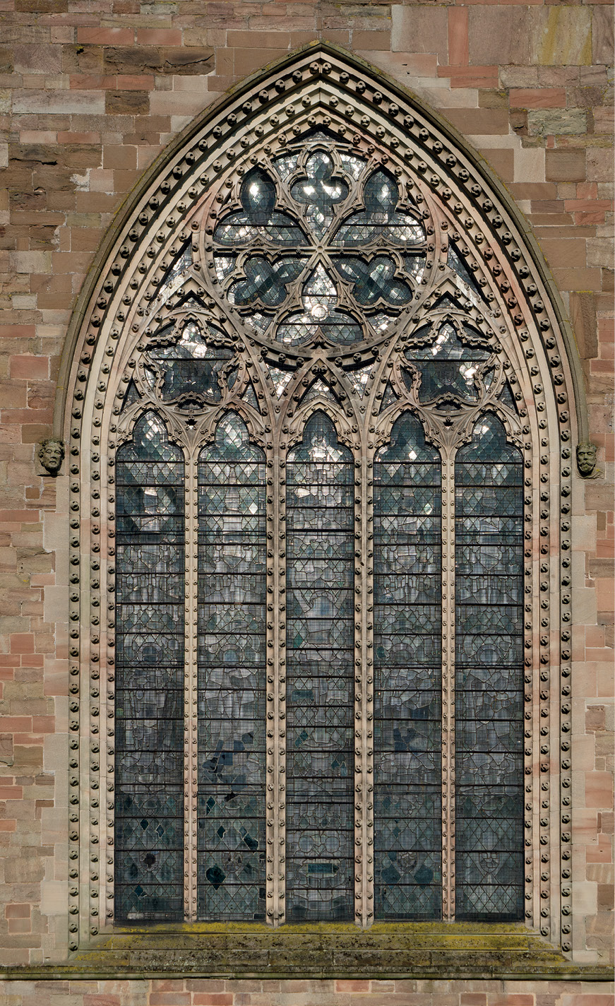 ABOVE Nowhere in England are there windows quite so encrusted with ball-flower as here at Leominster Priory, where the south aisle is a showpiece of Herefordshire Decorated. It was built in the early 14th century to provide the townspeople with space for worship, separate from that of the monks. The mason responsible must also have worked in the Hereford Cathedral workshop.