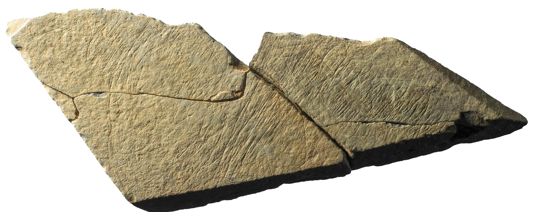 ABOVE & RIGHT Some of the fragments could be pieced back together: three of the refitted bits form Plaquette 1 (which is thought still to be only a portion of a larger object), while two come together to make up the near-complete Plaquette 2.