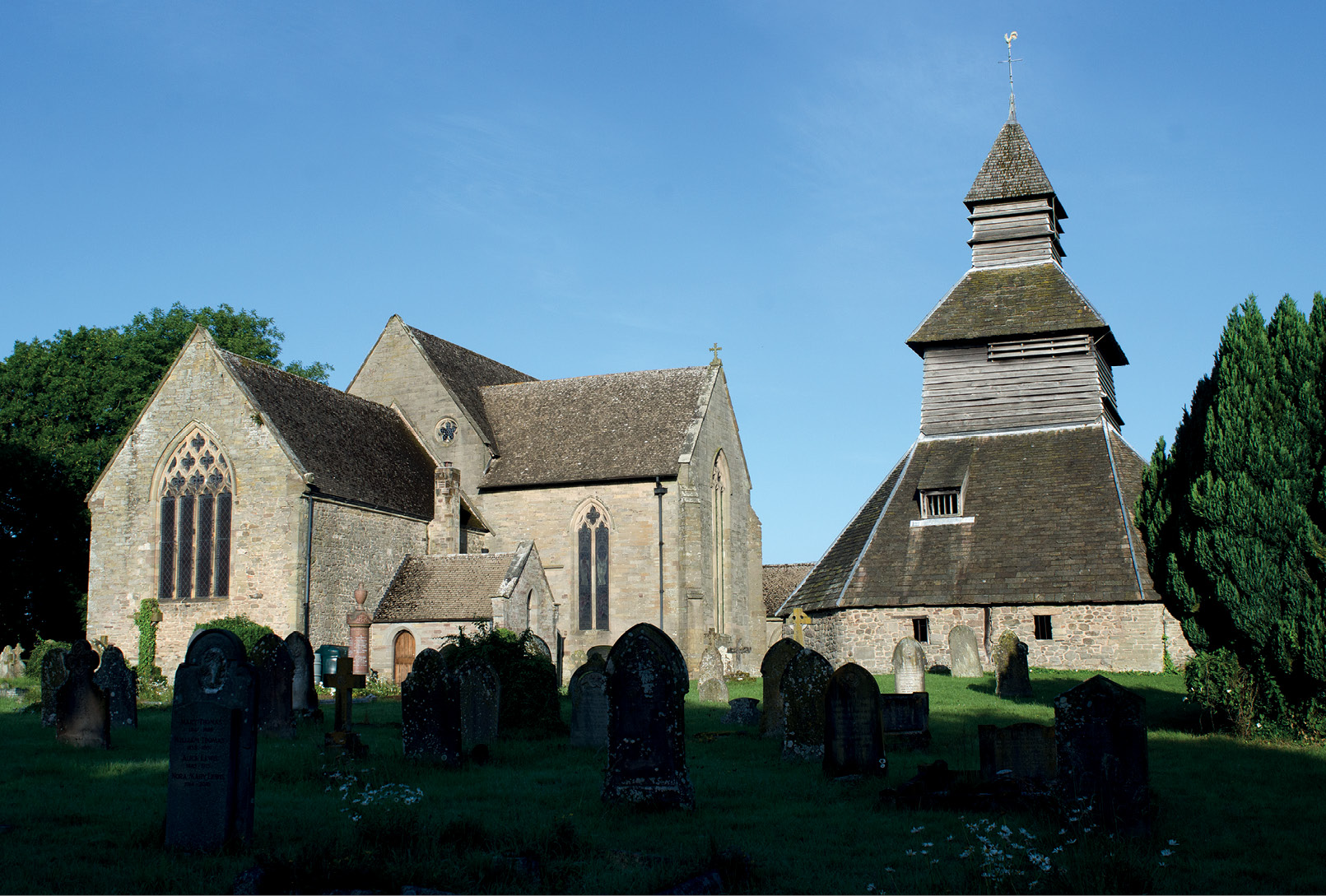 ABOVE The patronage of the Mortimers, one of the richest and most-powerful families in Hereford and the Marches, can be seen in more than a dozen local churches, including Pembridge. The detached belltower dates from the 13th century, but the ambitious church was entirely rebuilt c.1330. The marks of some eight or nine masons survive on the stonework, and similarities to Tewkesbury Abbey suggest the master mason had previously worked there.
