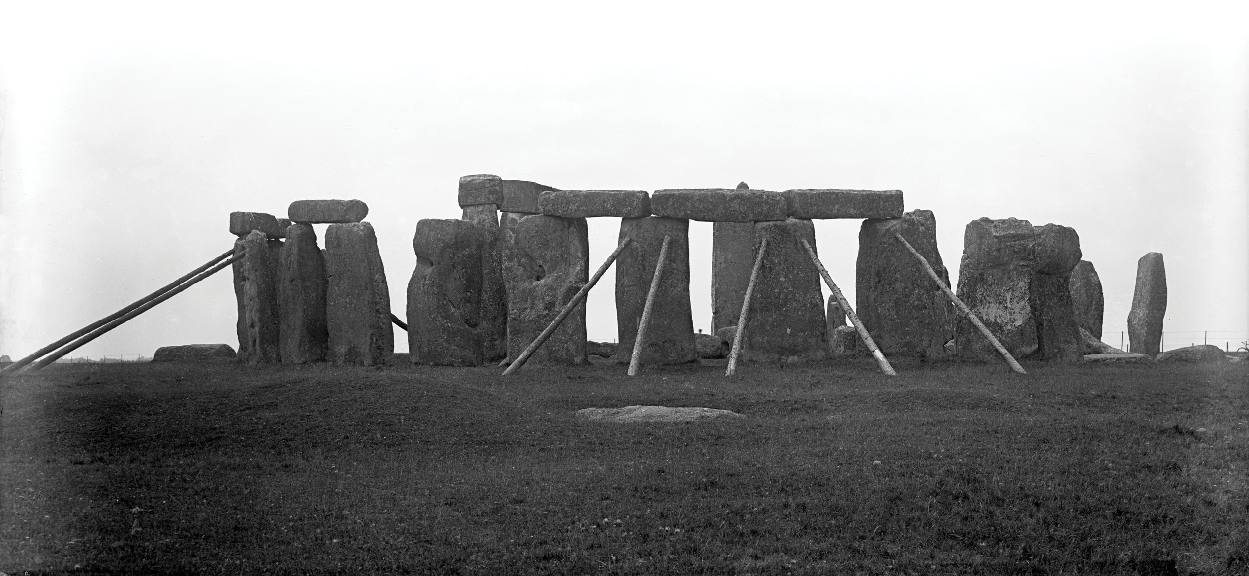 above Stonehenge in the late 19th or early 20th century (HEIR ID 36121; photo by R W Wylie), showing the wooden props that once supported some of its stones.