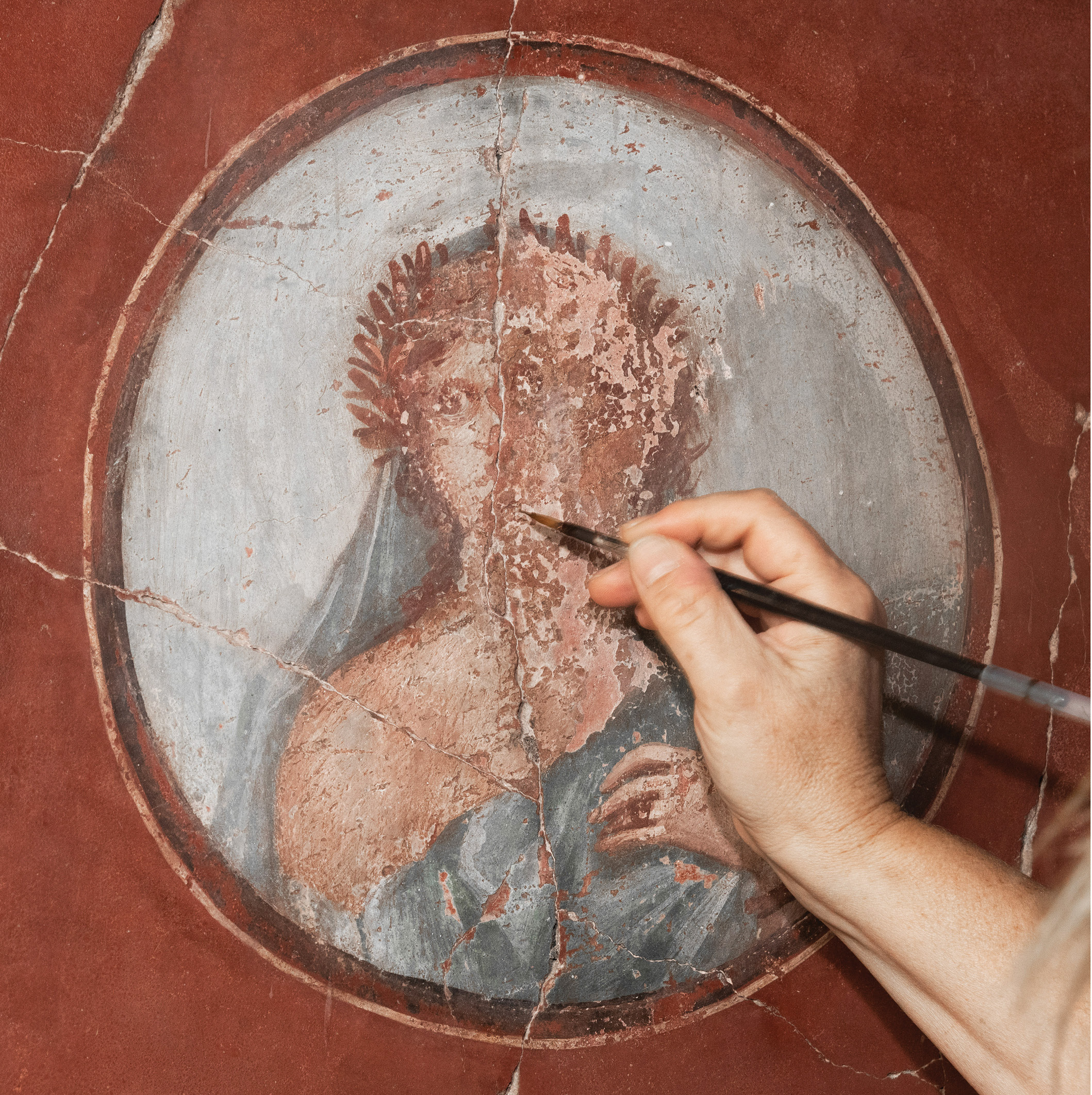 above Conservators carried out minimal in-painting in neutral tones, limited to areas of damage and loss. This approach allows visitors to appreciate the artistic quality of the paintings, while retaining archaeological information, and respecting the approach taken in 1938 to exhibit the wall-paintings as recomposed fragments.