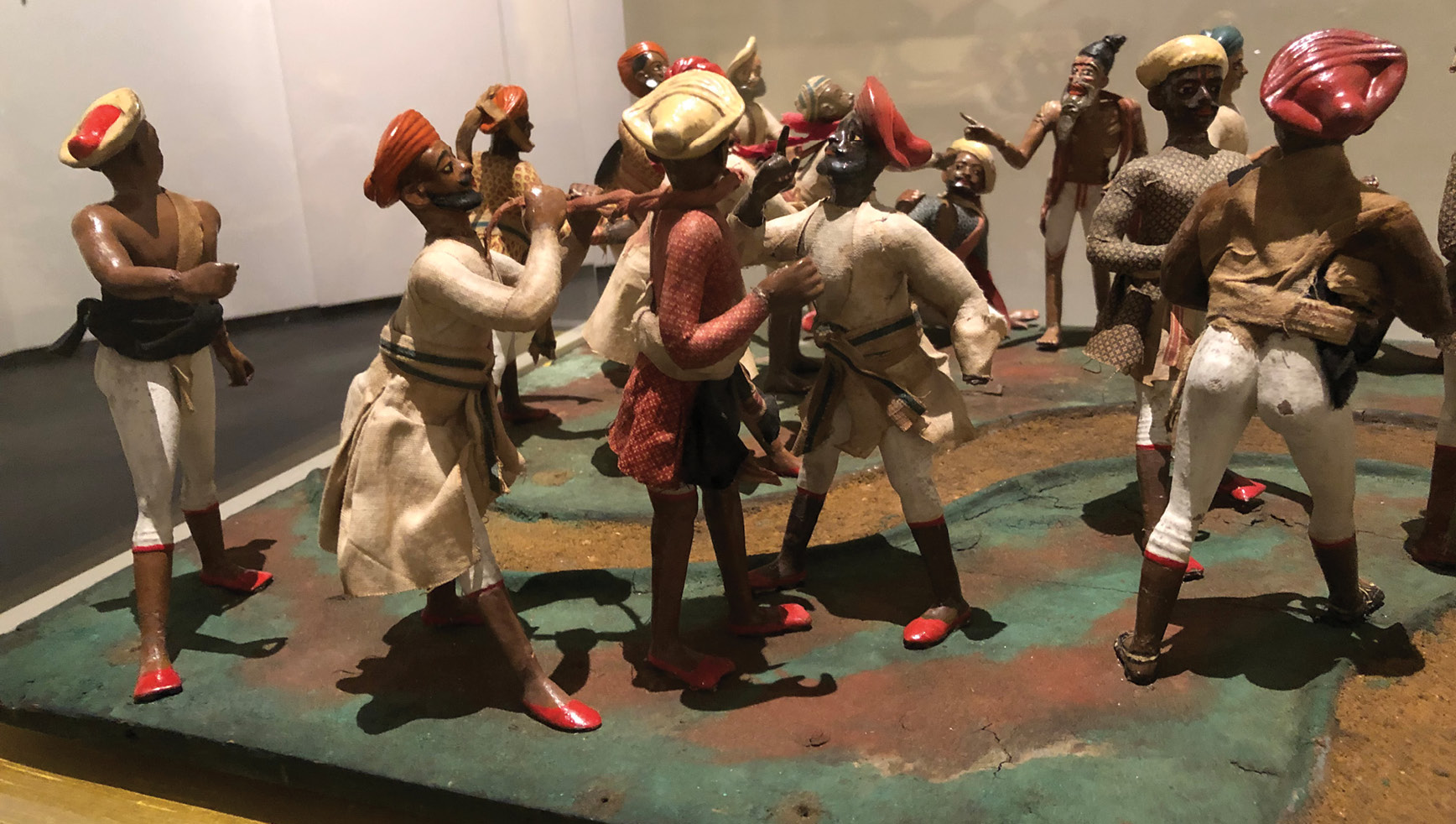 BELOW An early 19th-century model from India, showing travellers being assaulted and slain by Thugs.