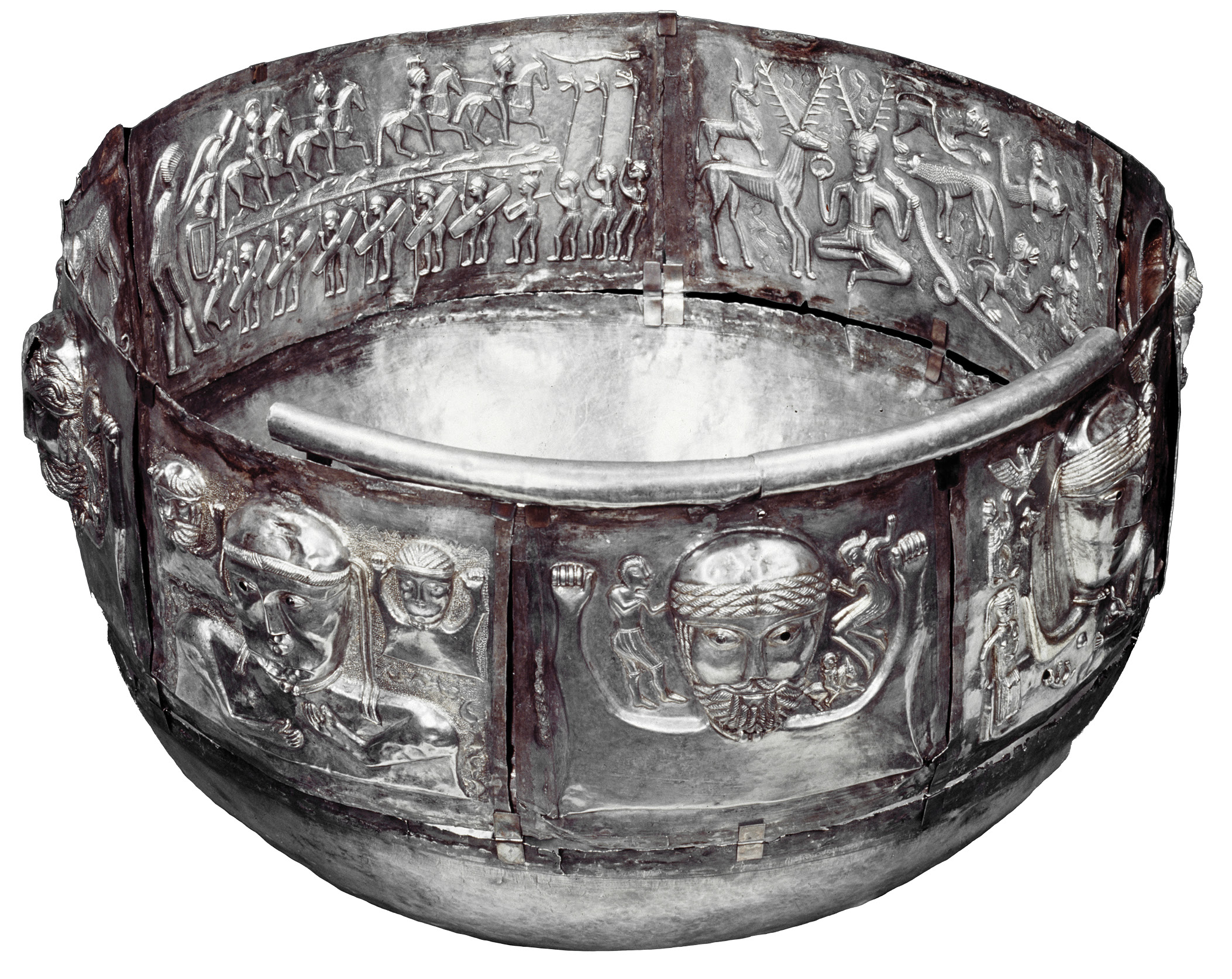 ABOVE Carnyx-players carrying animal-headed war horns process around the inside of the Gundestrup cauldron. This elaborate vessel was itself placed in a Danish bog, while the remains of instruments like those depicted here have been recovered from wetlands in continental Europe and Scotland.