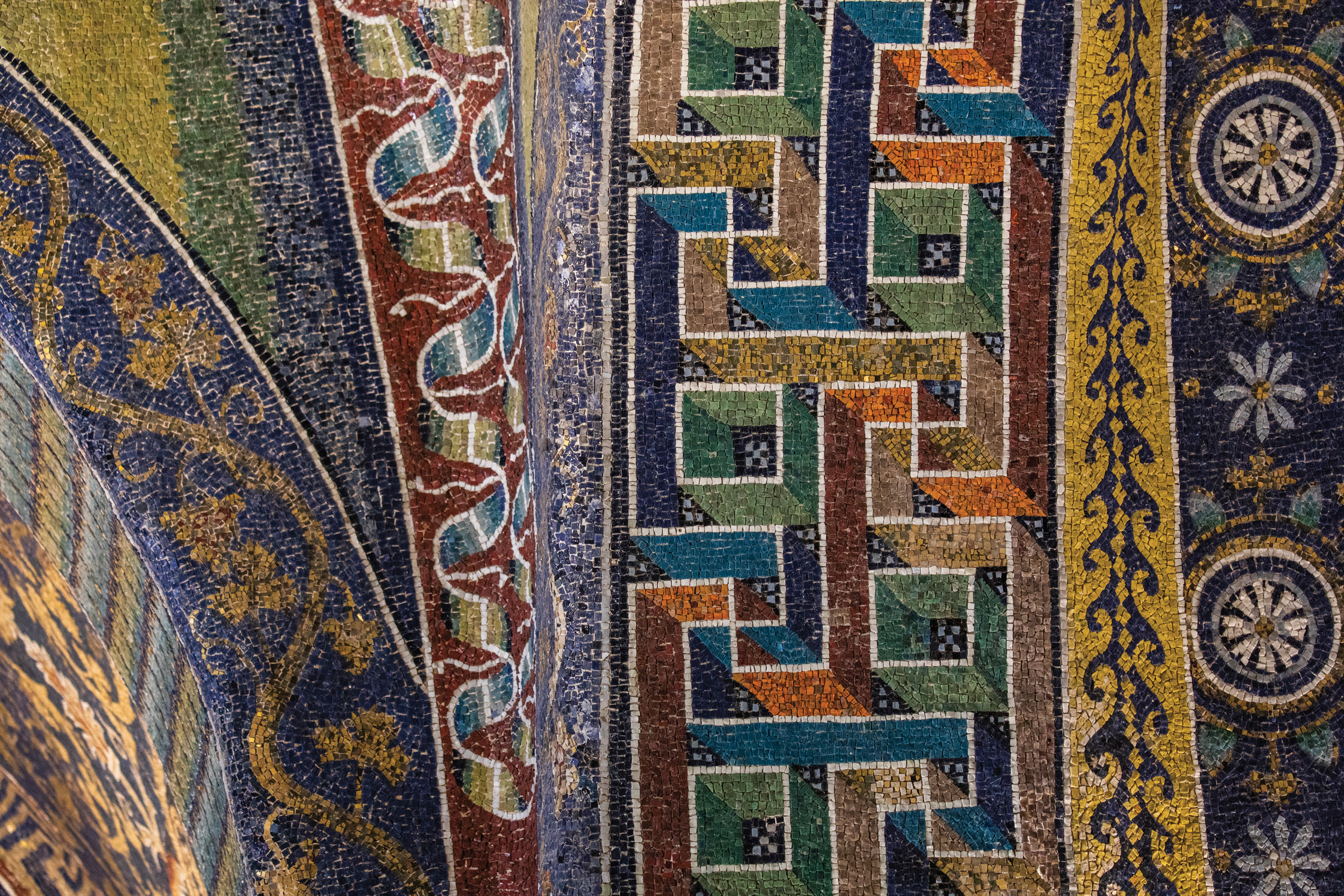 ABOVE & OPPOSITE Inside the ‘Mausoleum’ of Galla Placidia, the dome is covered with a starry sky and the supporting structures with symbolic and colourful bands of mosaic.