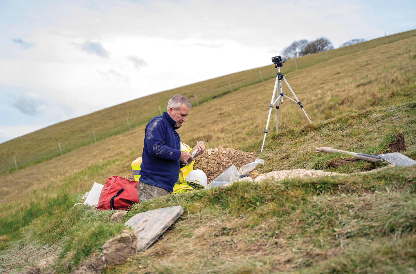 below Professor Phillip Toms of the University of Gloucestershire, shown here labelling samples from the Giant, carried out the OSL analysis that established new dating evidence for the hill figure.