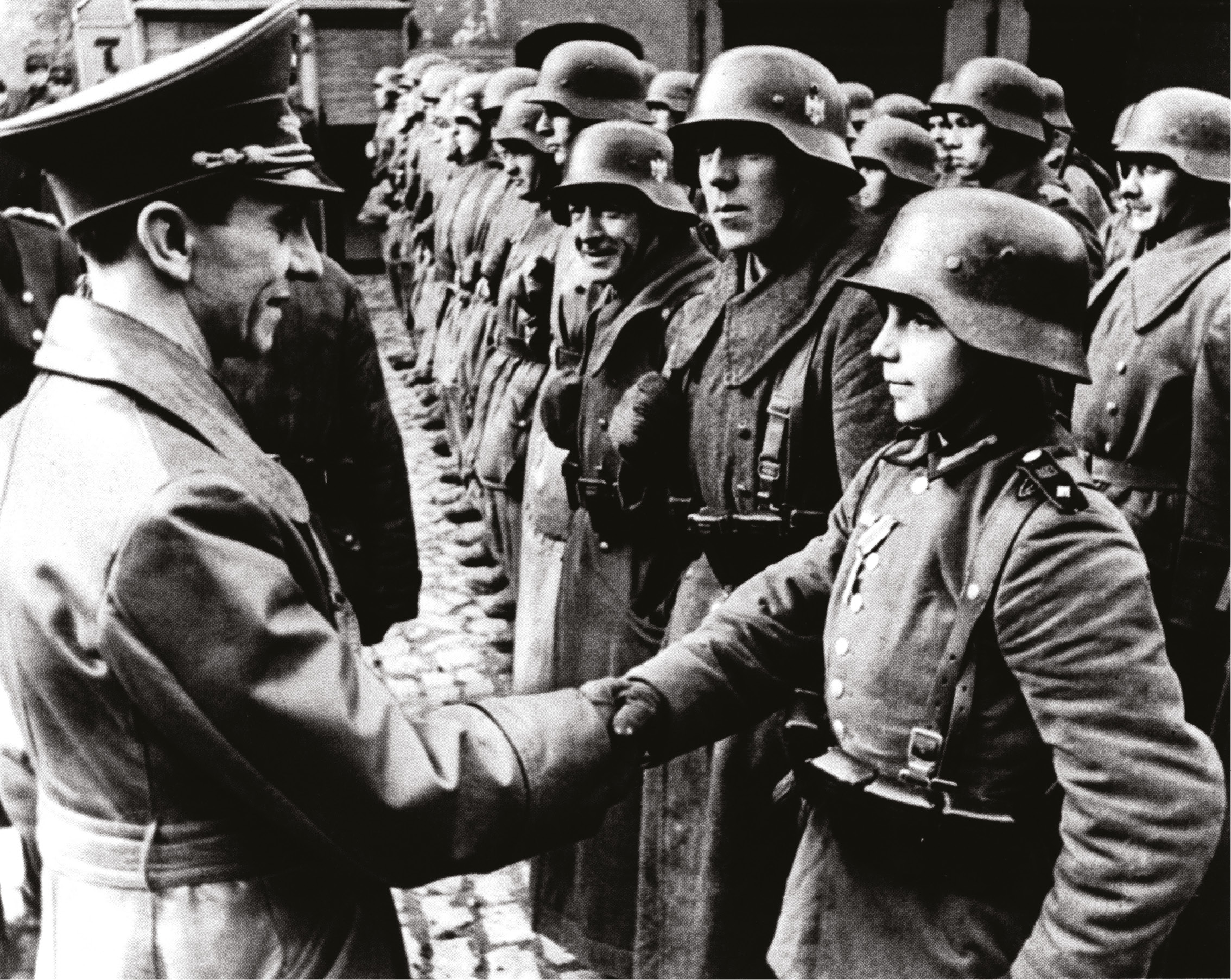 BELOW Goebbels inspects some of the last defenders of the Third Reich.