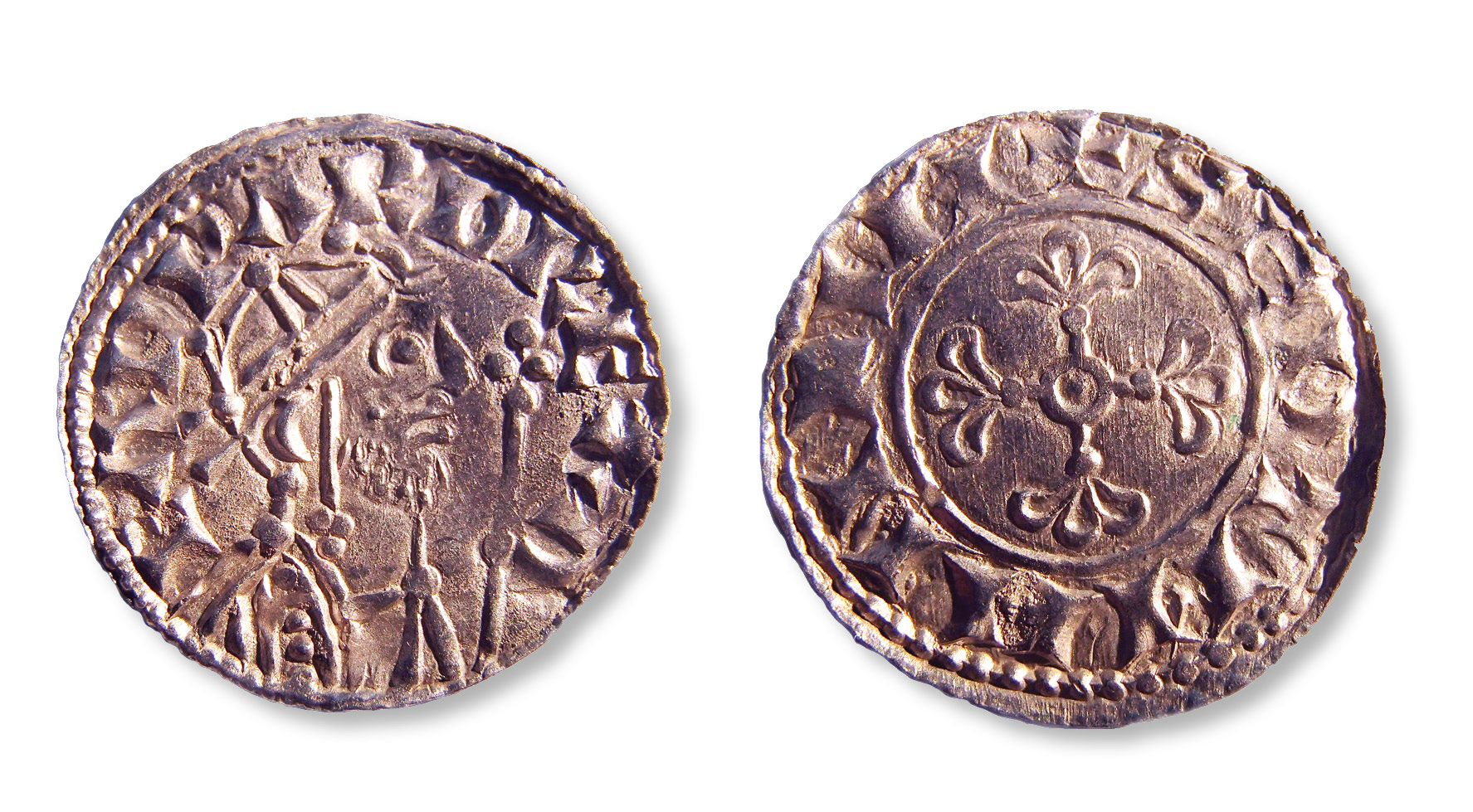 This coin is a ‘mule’, created using two dies from different coins one side shows a design from an issue of Edward the Confessor (right) and the other bears one of William I (far right).