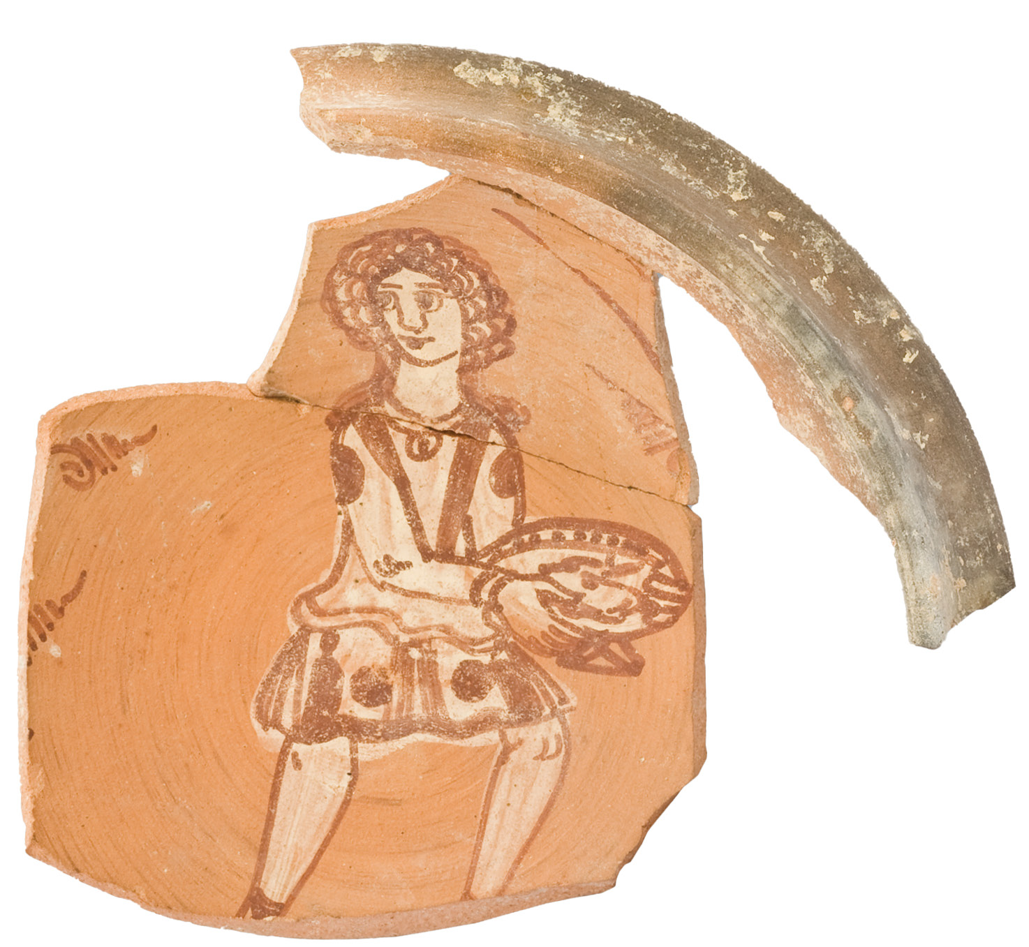 LEFT A Jerash bowl showing a young male, most likely a servant. Such bowls were painted on the inside with two colours, and sometimes feature stamped decoration. This type of bowl was manufactured in the city in Late Antiquity, from the mid-6th century to the mid-7th century AD.