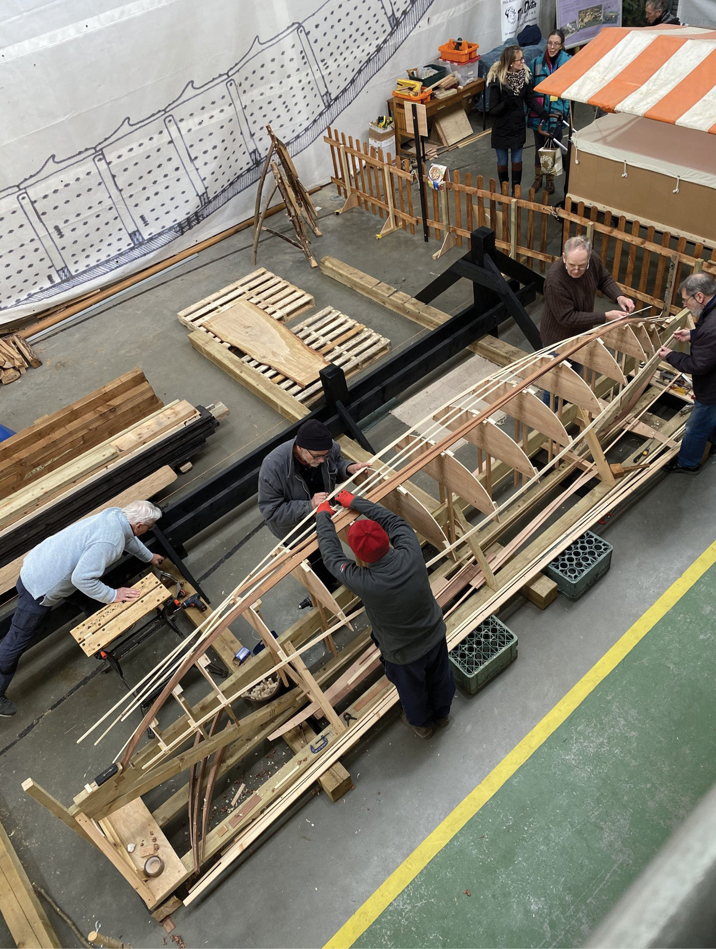 below The Sutton Hoo Ship’s Company are working to build a full-sized, seaworthy reconstruction of the famous Anglo-Saxon vessel excavated at Sutton Hoo in 1939. At present they are constructing a 1:5 model upside down, using modern techniques and materials to help guide the build process.