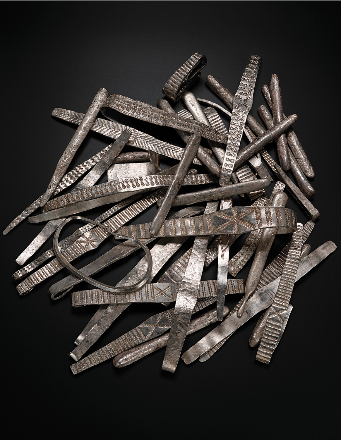 above right More than double the amount of silver bullion was found in the hidden lower layer.