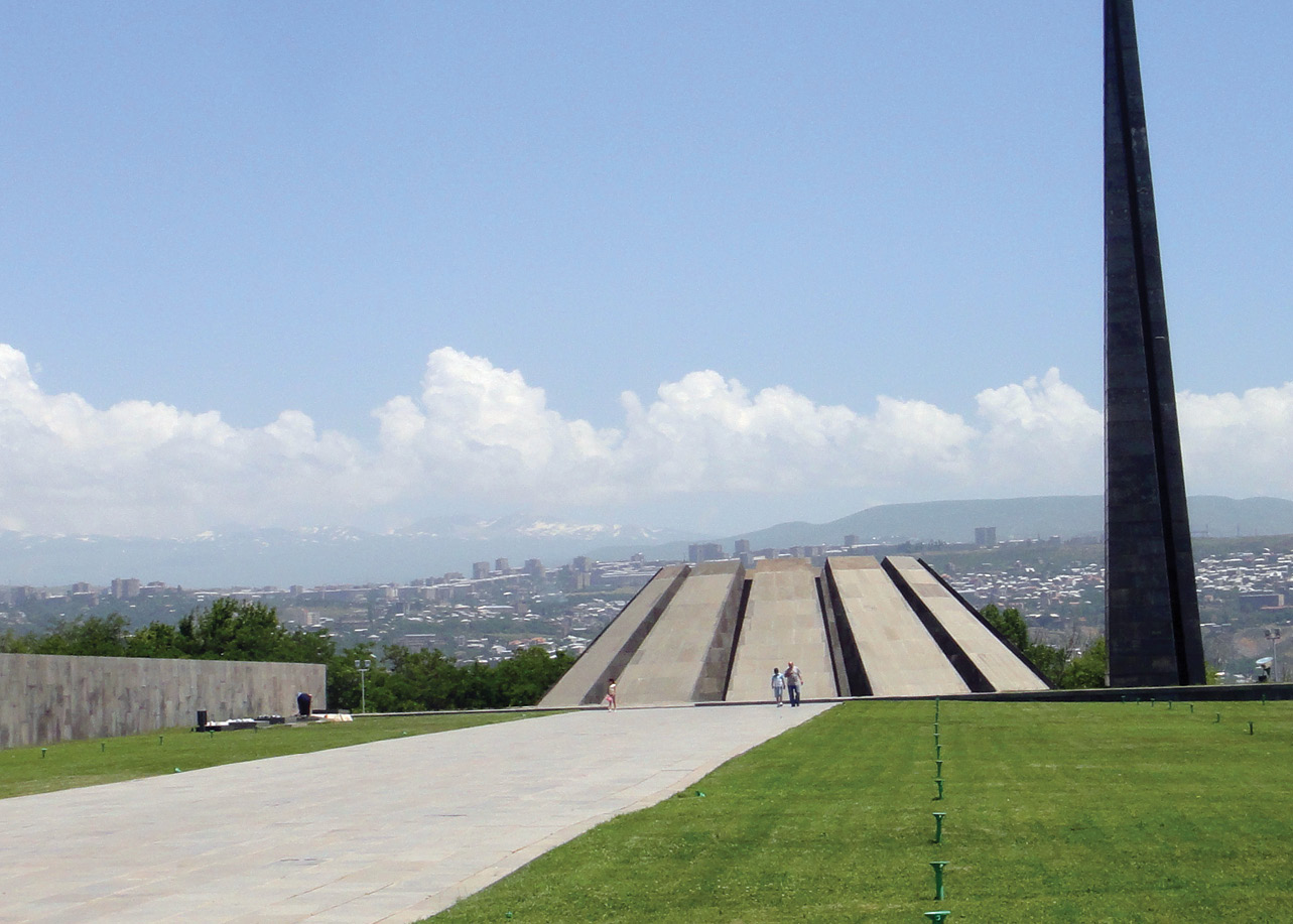 left A henge monument? These are two views of the genocide monument erected in the hills above Yerevan. To my archaeological eyes, it looks very like a henge monument with a circle of stones and a standing stone, admittedly in fact an iron spike, adjacent to it. To the left is the interior of the monument, with a fire of remembrance at the centre surrounded by a circle of leaning stones. Does it perhaps express the same sort of idea as does a henge monument?