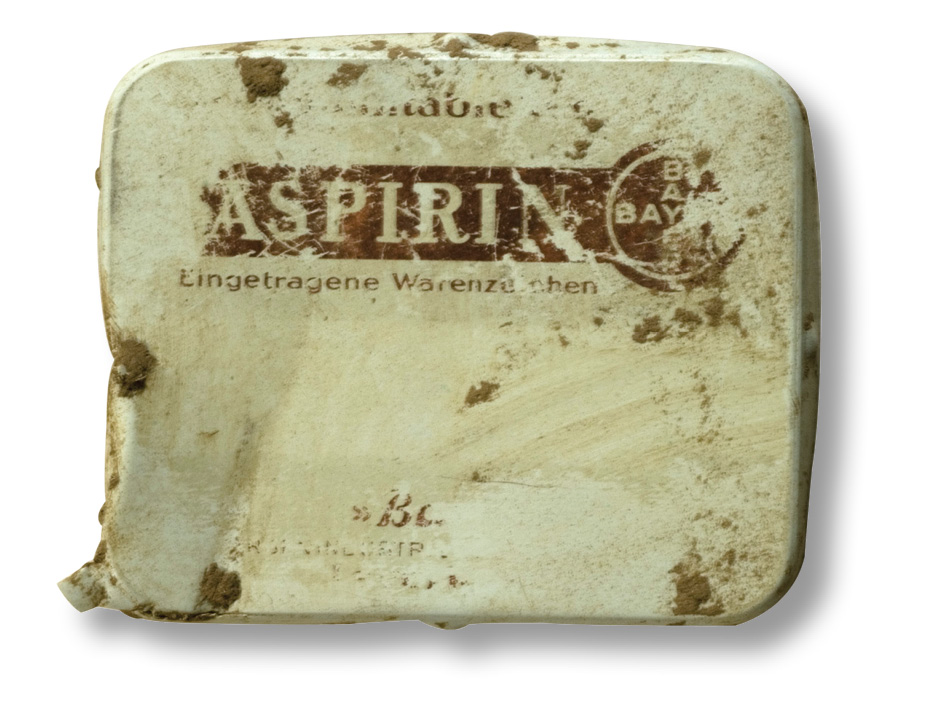ABOVE A tin that contained asprin. RIGHT This is a stencil that reads: Ein Andenken an die Gefangenschaft 1944/45 Cherbourg, which translates as 'In memory of captivity from 1944 to 1945 Cherbourg'.