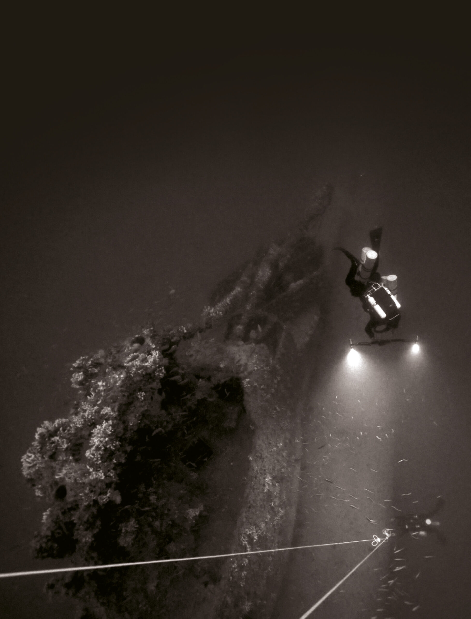 Above Divers explore the shipwreck of HMS Olympus off the coast of Malta.