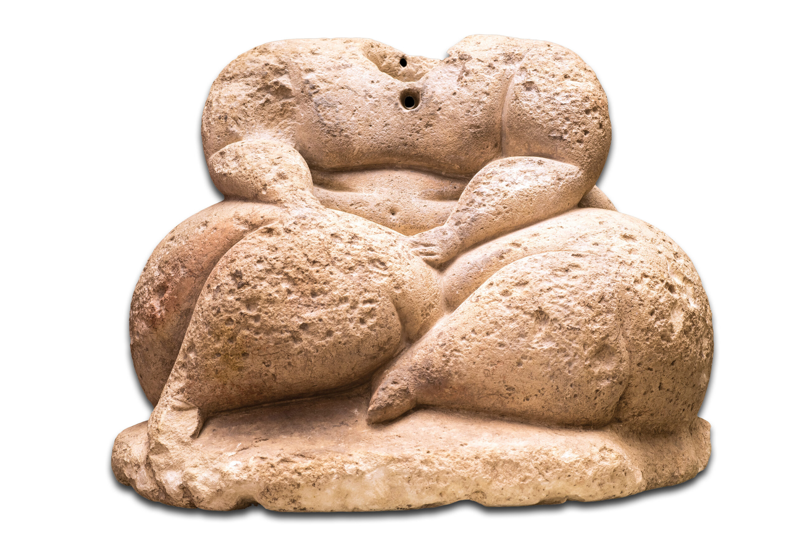 Above A figurine of a seated corpulent person, found at Hagar Qim, 3000-2450 BC. The socket for a head is visible. Size: 29.4 x 24 x 17cm