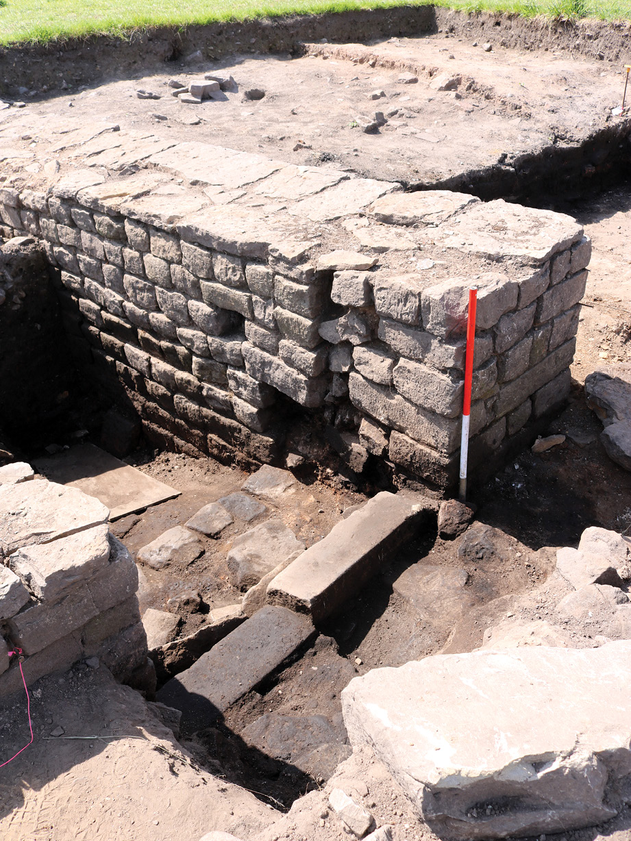 RIGHT These are the remains of a monumental rectangular building originally thought by Ian Richmond to be a tower. Thirteen courses of high-quality masonry survive. The small square hole visible in the fourth course down may be a putlog hole to accomodate timber scaffolding during the building’s construction.