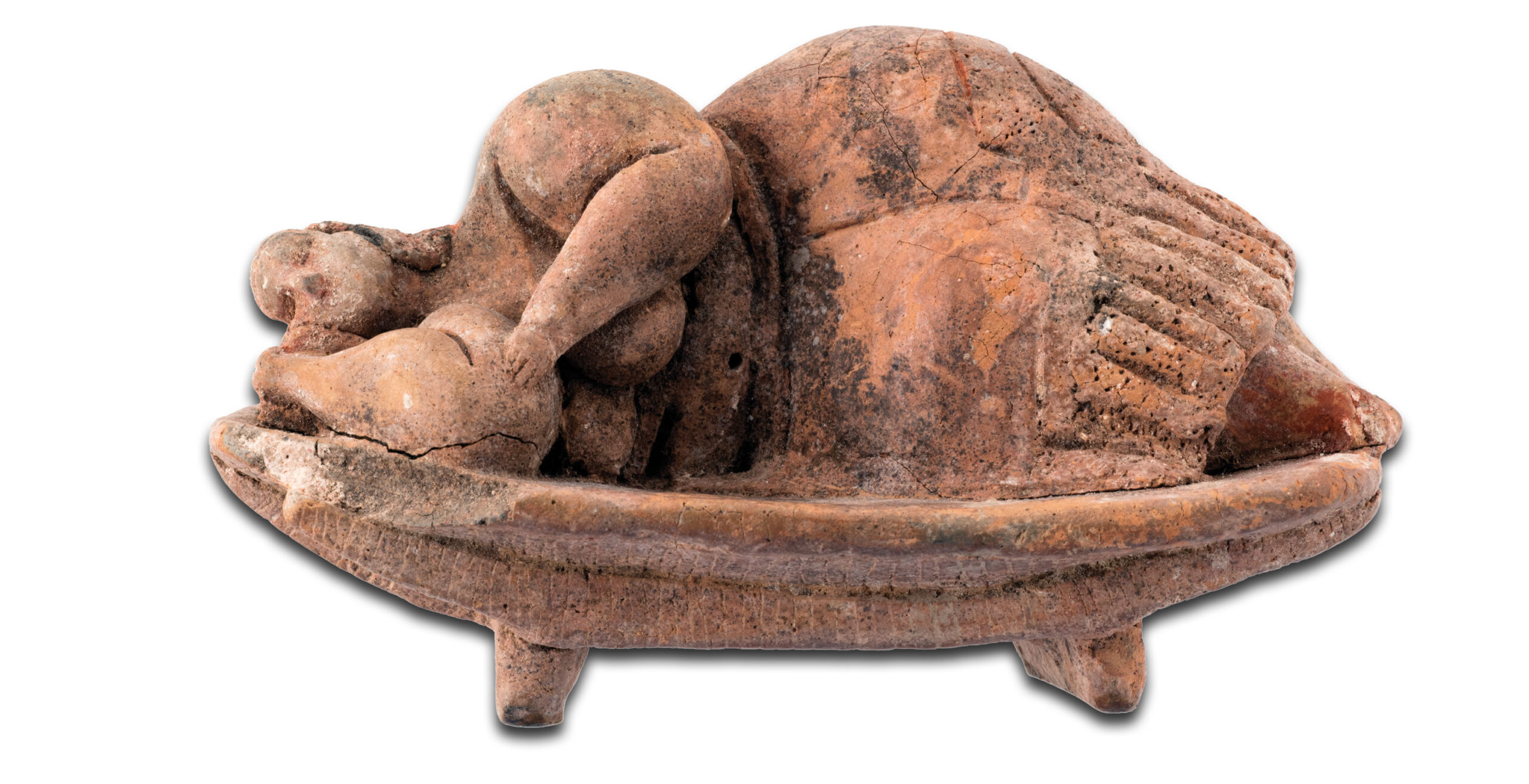 Above The Sleeping Lady, discovered in the Ħal Saflieni hypogeum, 3000-2450 BC. Size: 6 x 12 x 6.6cm