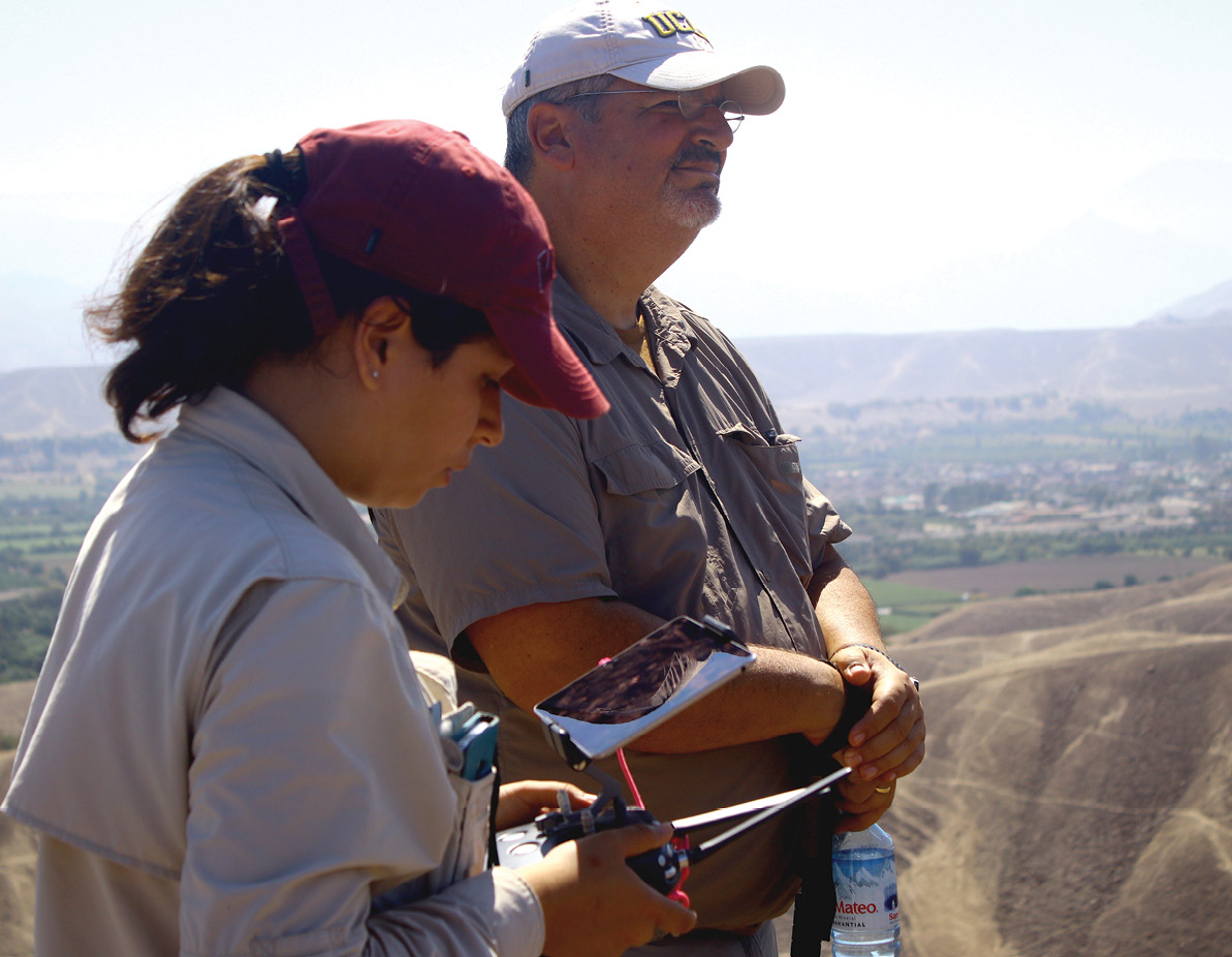 below Drone technology allows large expanses of landscape to be surveyed. Here, Luis Jaime Castillo, Karla Patroni, and Fabrizio Serván prospect for new sites on the Palpa plateau.