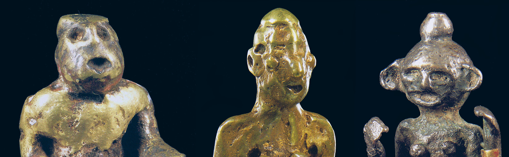 right Ancestor figurines with grotesque features from the Island of Flores.