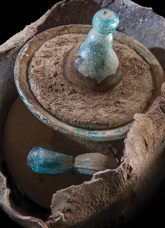 RIGHT Two cinerary urns, including this glass vessel, were uncovered.