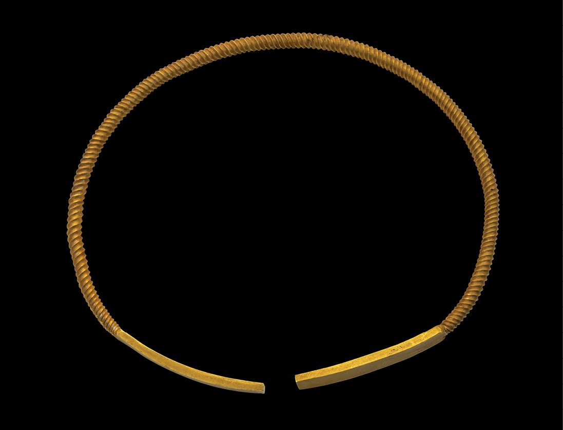 BELOW This gold torc, weighing 335.5g, was found around the neck of the young man buried in Kurgan 4 at Eleke Sazy.