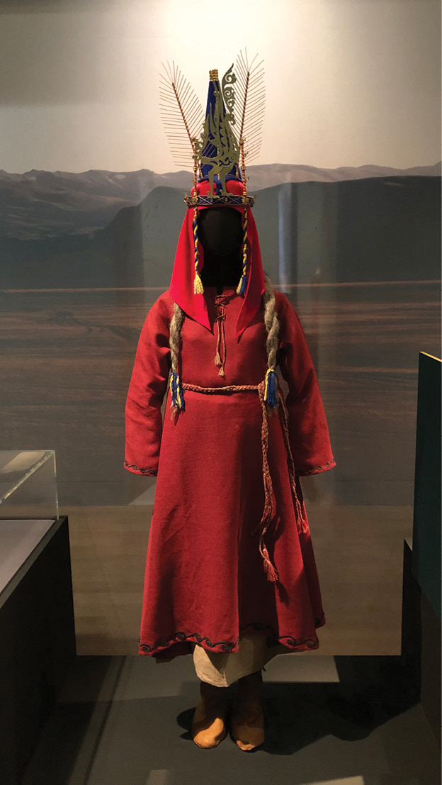 RIGHT The Urzhar priestess was buried with an elaborate headdress and grave goods that reflect her status as a respected herbalist. Reconstructions of funerary outfits like this one show how vibrant the textiles of the Saka were.