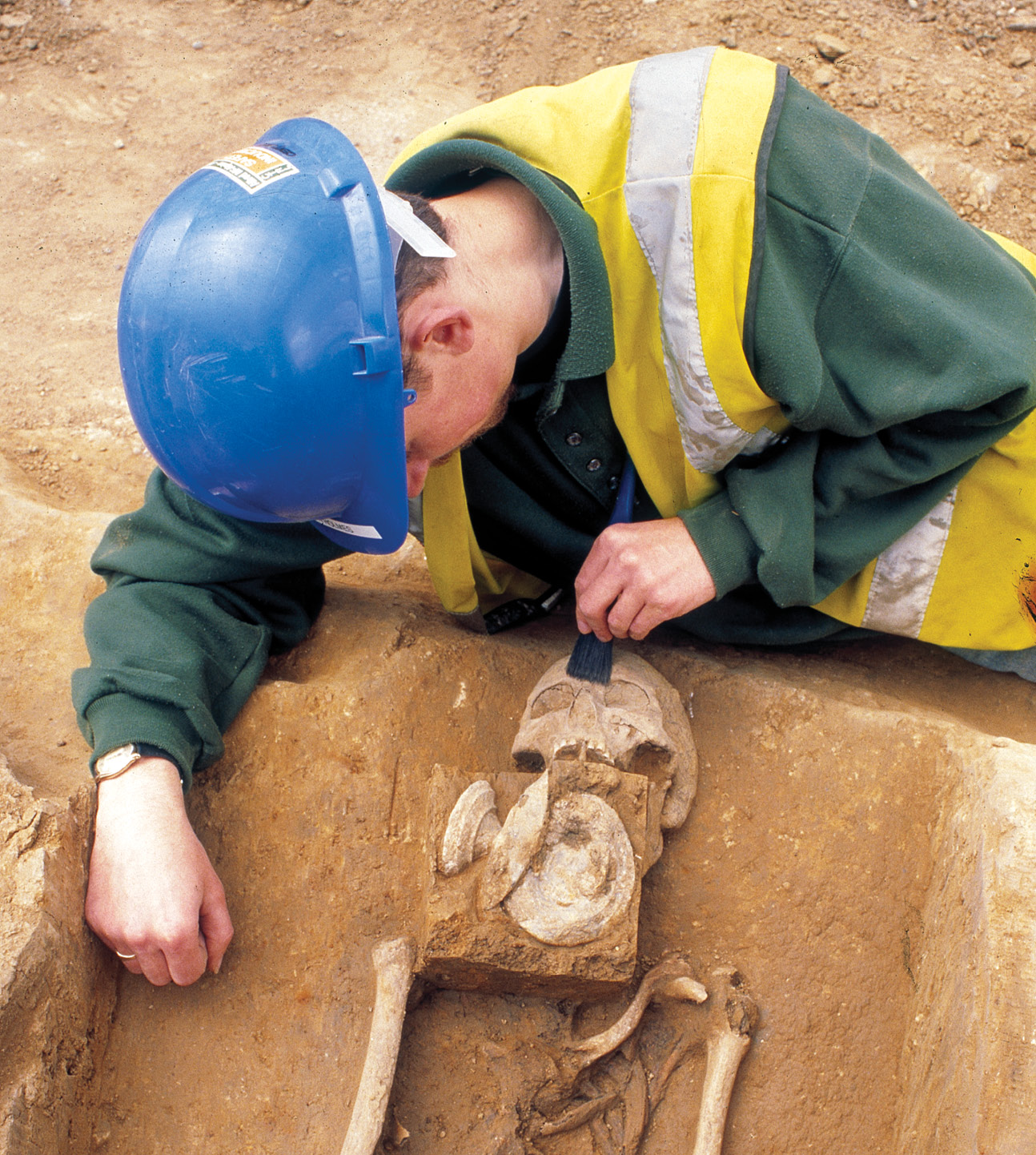 above It was not just famine victims who were buried at St Mary Spital. Eight people were found buried with chalices, including this individual, who was also sent to the grave with a paten a type of plate, used for holding bread during the Eucharist, that sometimes also served as a chalice lid. It is commonly believed those buried with such an assemblage were members of the clergy.