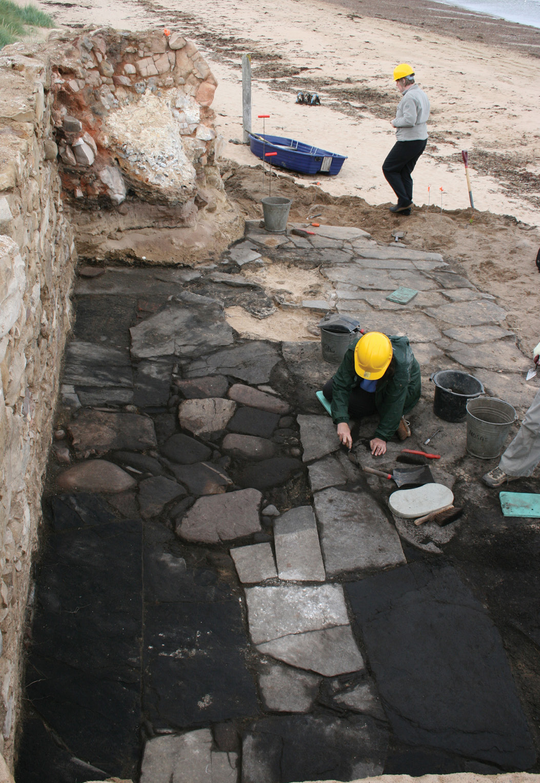 Right The large shale slabs lining the floor of the Old Salt House and (inset) one of the masons’ marks were these carved to ward off the evil eye?