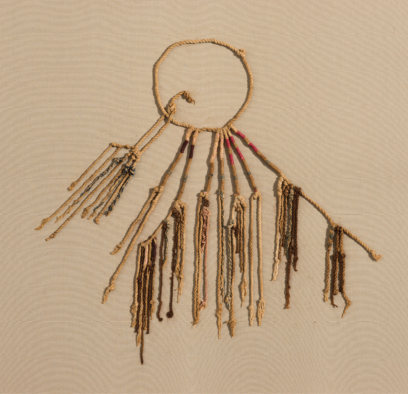 ABOVE LEFT This khipu was created during the Wari period, AD 600-900. Elements such as the knots and colours could be used to record a range of information.