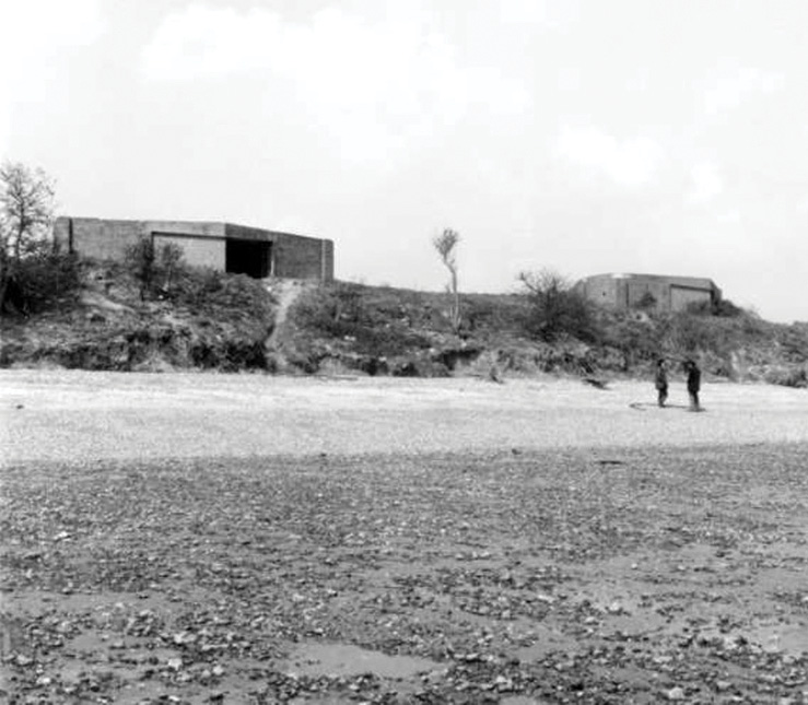 ABOVE Military installations built on the cliffs in 1940 to protect Essex from a seaborne invasion proved no match for accelerating coastal erosion. The image on the left shows concrete emplacements in 1950; that on the right shows remains undermined in 2021.