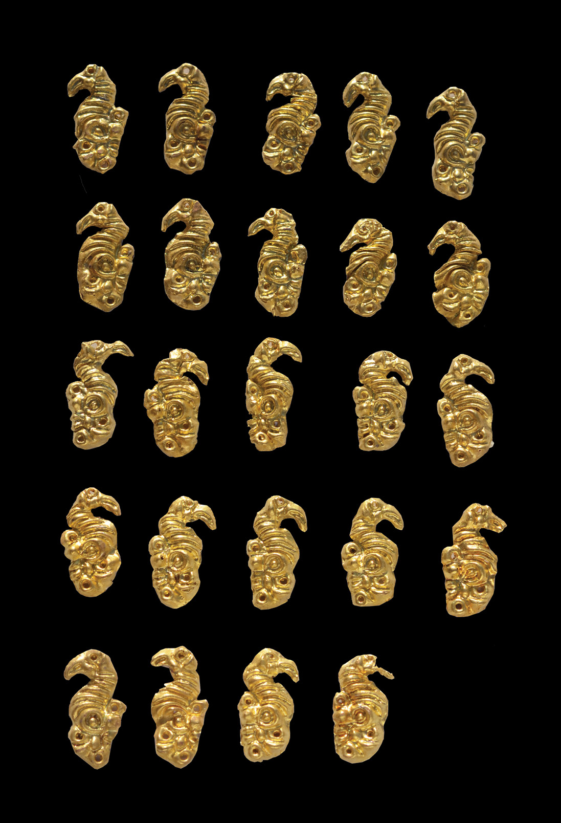 BELOW Depictions of mythical creatures like griffins, as seen in these gold clothing plaques from Eleke Sazy, are a common feature of Saka design.