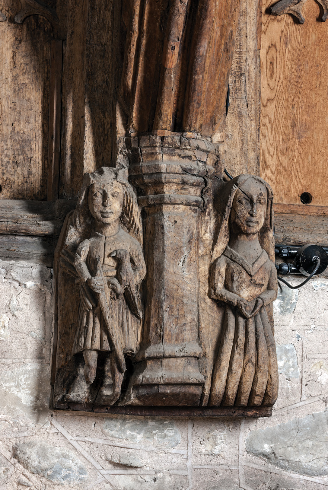 above Much like the margins of illuminated manuscripts, roofs in some Welsh late-medieval churches include secular caricatures, like this telling contrast at St Mary’s church, Cilcain, Flintshire, between a lord and lady and a pair of peasants.