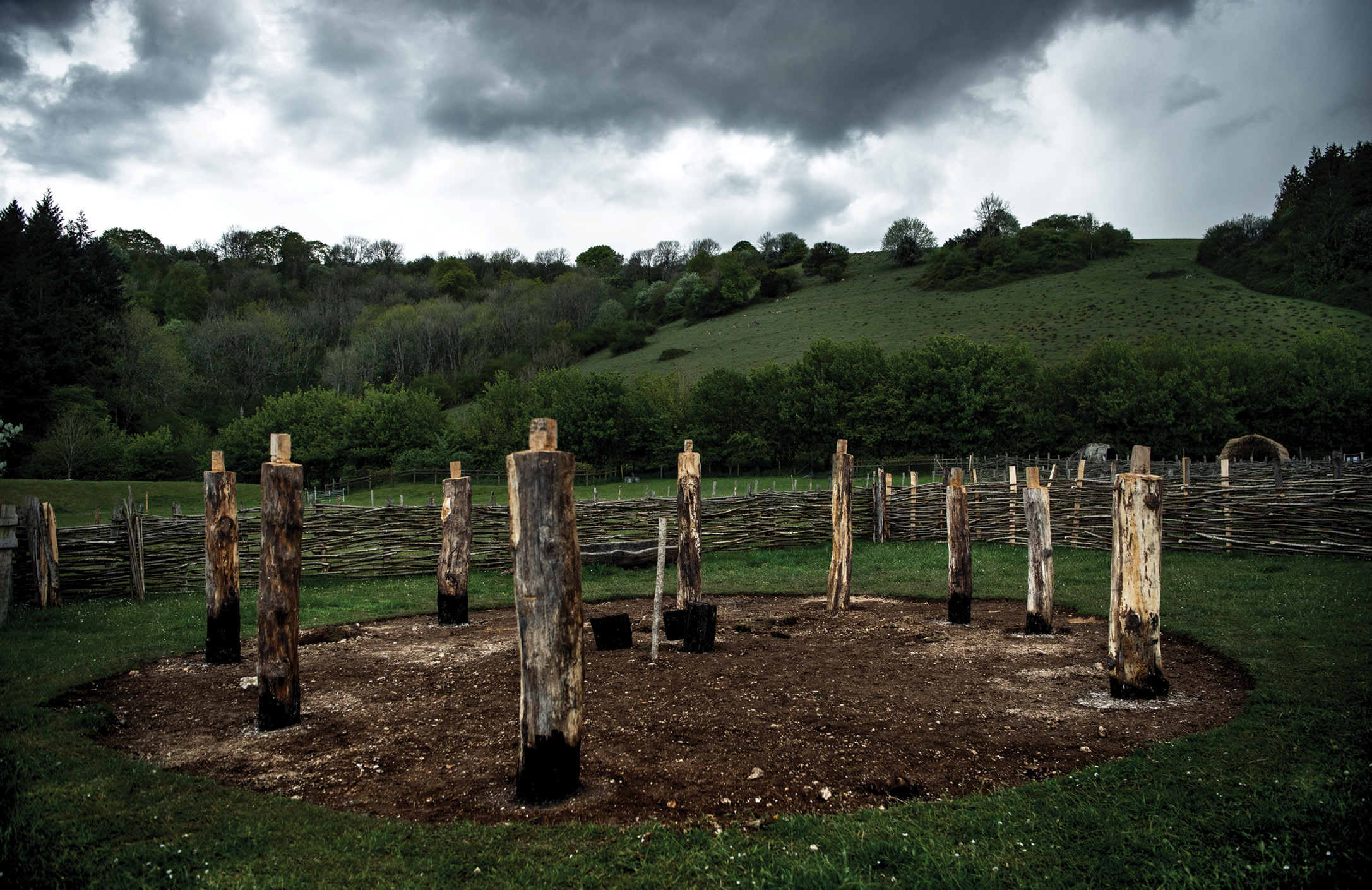 above Forming a footprint: the upright timbers stand in position.