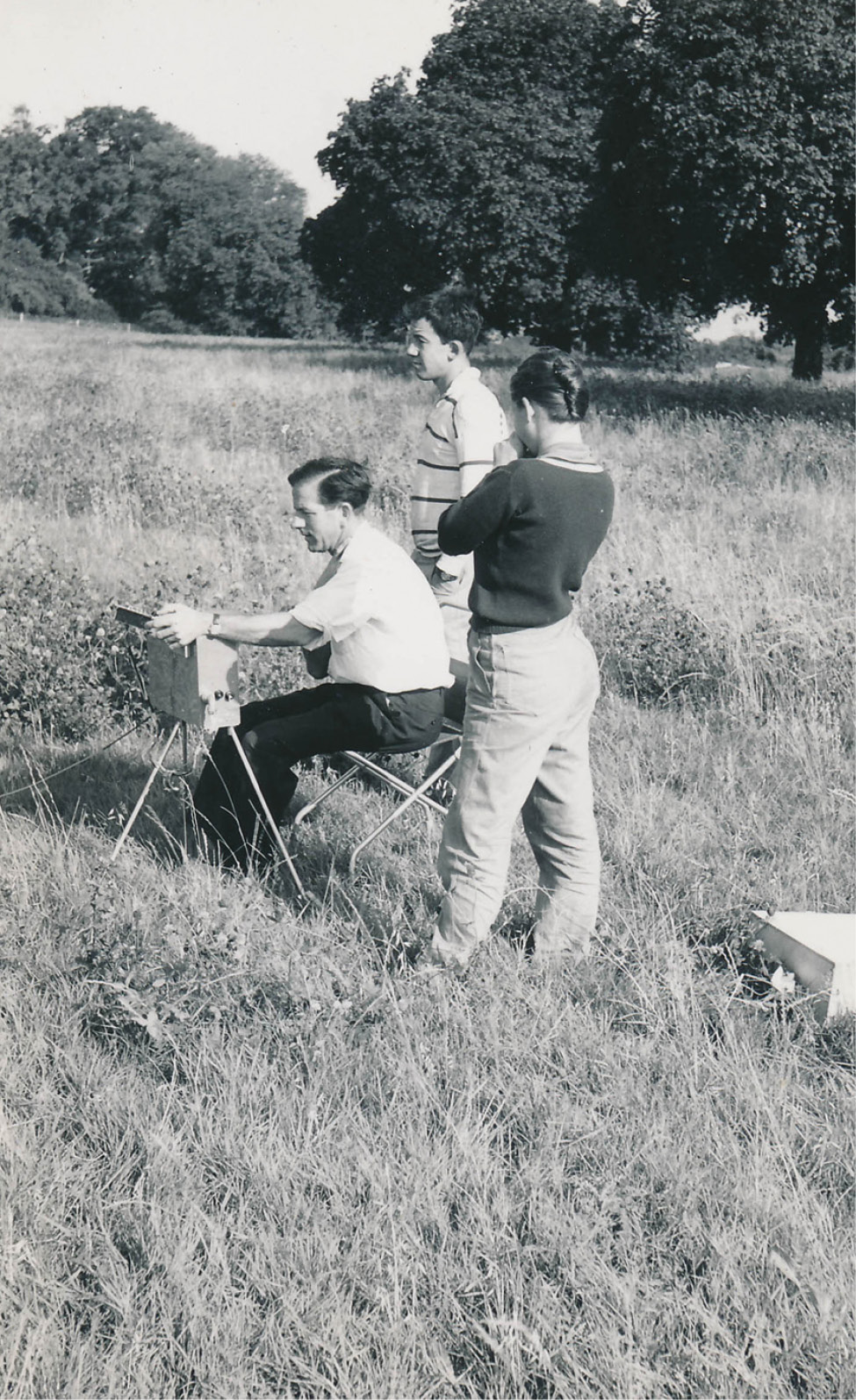 BELOW Felicity Wild and I helped Martin Aitken with the proton magnetometer survey. I wore my school rugby jersey. She took off her sweater in the hot weather and never saw it again.