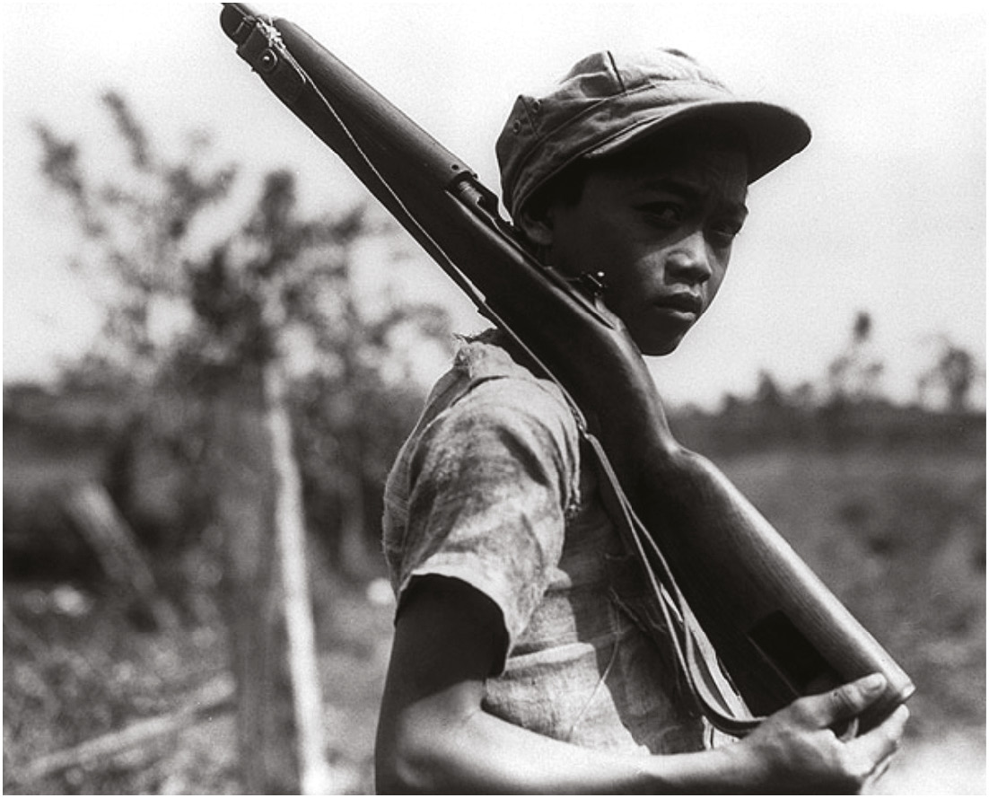 ABOVE A young Filipino guerrilla. The resistance in the Far East was no less important than that in Europe during the Second World War.