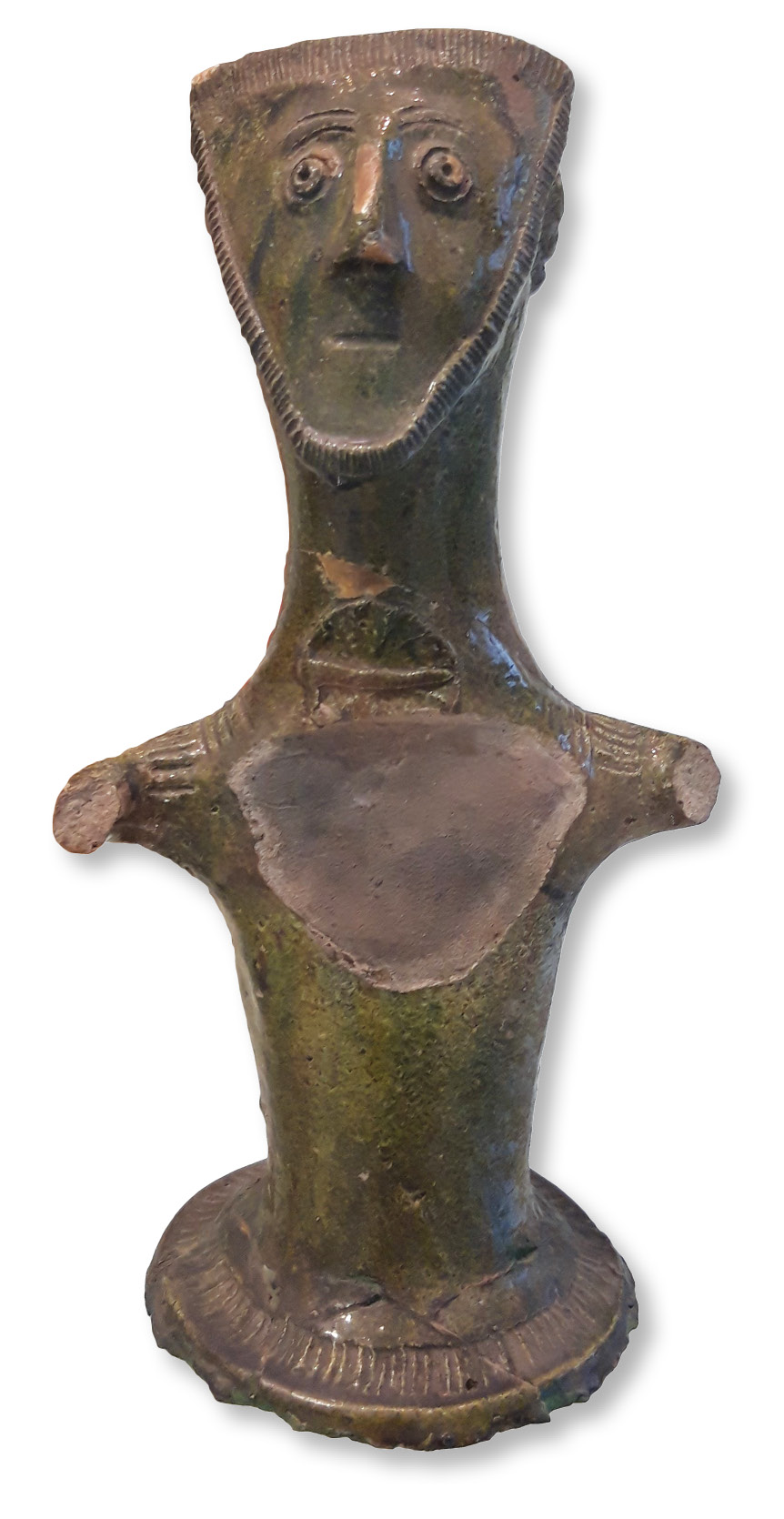 right Previously displayed in the University of Nottingham Museum’s ‘face pots’ exhibition (see CA 358) and returning for Cultures of cloth, this salt vessel from c.1250-1350 depicts a woman in a fashionable pleated headdress, with a large brooch securing her gown at the throat. Examples of similar brooches are displayed alongside the Nottingham green-glaze figure in the current displays.