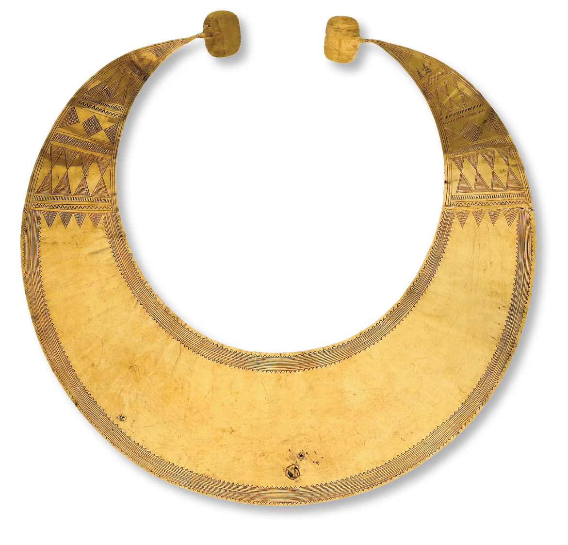 Golden finds: this lunula (sheet gold collar, left) from Blessington, Co. Wicklow, may reflect beliefs centred on solar imagery. The Mold cape (above), found in a c.1900-1600 BC grave in Flintshire, Wales, may have been worn to convey a person’s status, possibly in a ceremonial role.