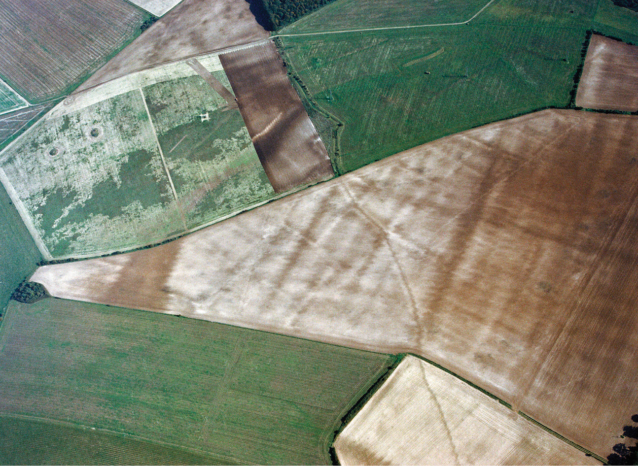 above Crawford was especially interested in the morphology of field systems, like these pre-Roman so-called ‘Celtic’ fields at Knoll Down, Hampshire; snaking across the centre of the picture is Grim’s Ditch, part of an extensive series of linear features that cross this part of Cranborne Chase, probably dating from the Bronze Age.