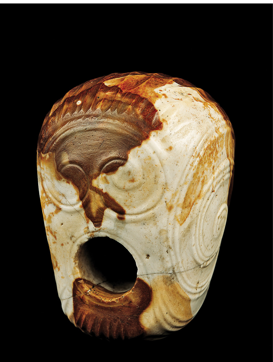 above This ornate macehead was found in the great passage tomb at Knowth and is usually displayed at the National Museum of Ireland.