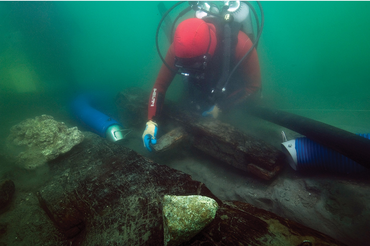 right Ship 17 lies 6.5-7m below sea level, allowing a small team to excavate and study it for up to eight hours a day. Here, a diver is examining a tenon that passed through the keel.
