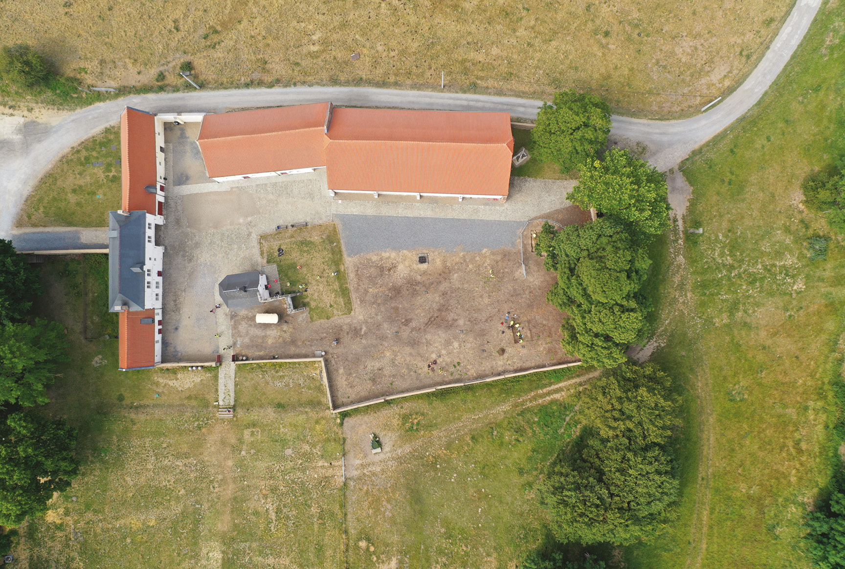 ABOVE Drone shot of Hougoumont Farm. Note the excavation trenches, bottom right of the courtyard.
