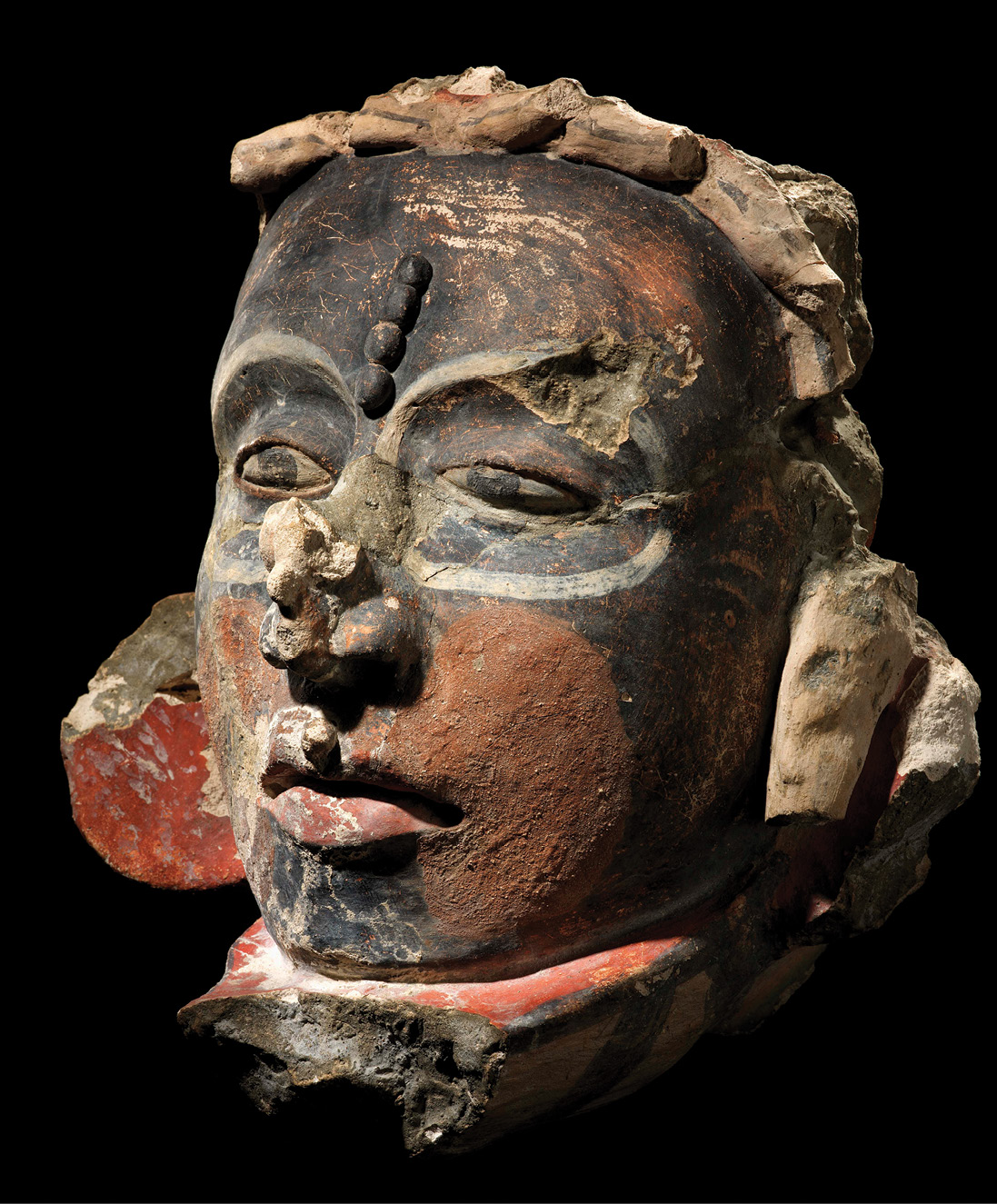 RIGHt This sculpted stucco Maya head excavated at Uxmal, Mexico, may have once decorated the House of the Governor.