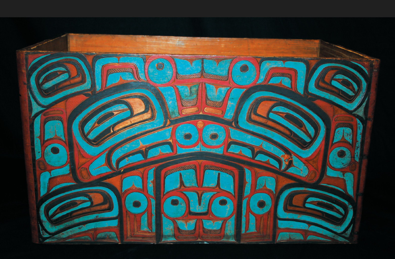 11. Kerfted chest with carved and painted formline relief. This box was probably made by Heiltsuk artist Captain Richard Carpenter (Du’klwayella) during the late 19th century. These chests held clan regalia and treasures that were used and displayed only for important ceremonies.
