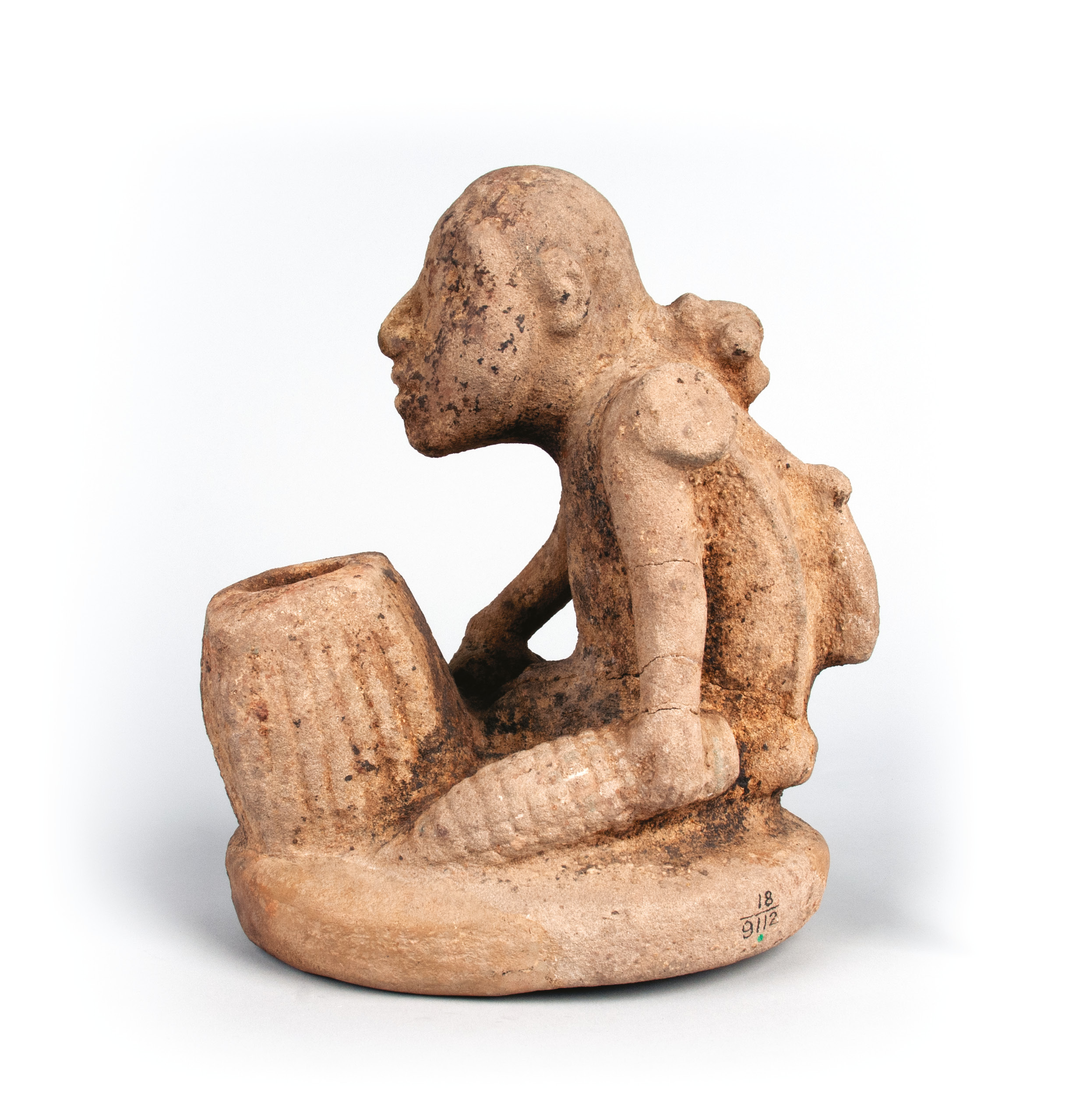 right Earthmother effigy pipe found in the Spirit Lodge. Stone, c.AD 1400. Size: c.25.5 x 15 x 10cm