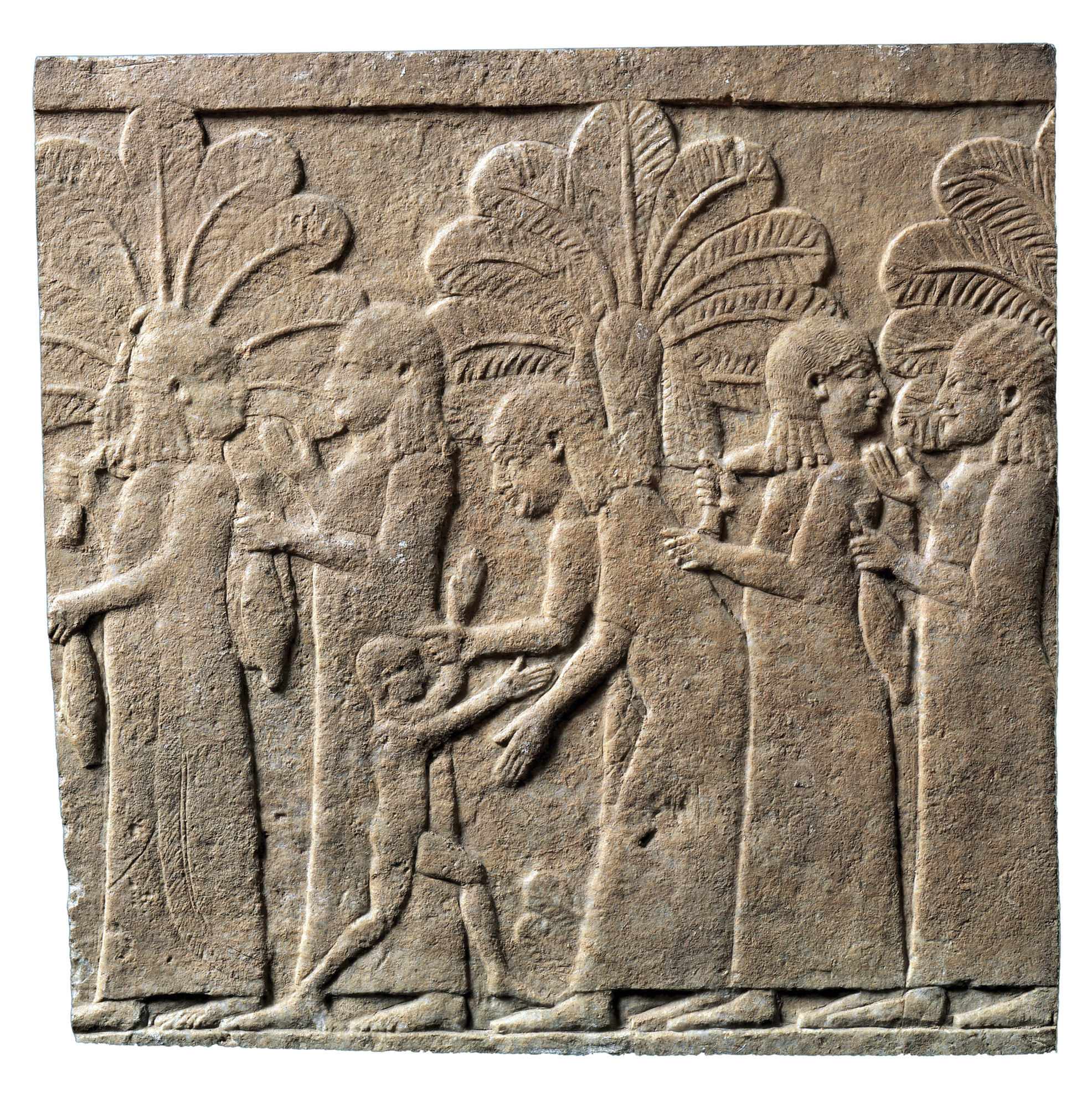 above Assyrian relief showing deported women, from Court J of the North Palace of Nineveh (Iraq). Limestone, reign of Ashurbanipal (669-626 BC).