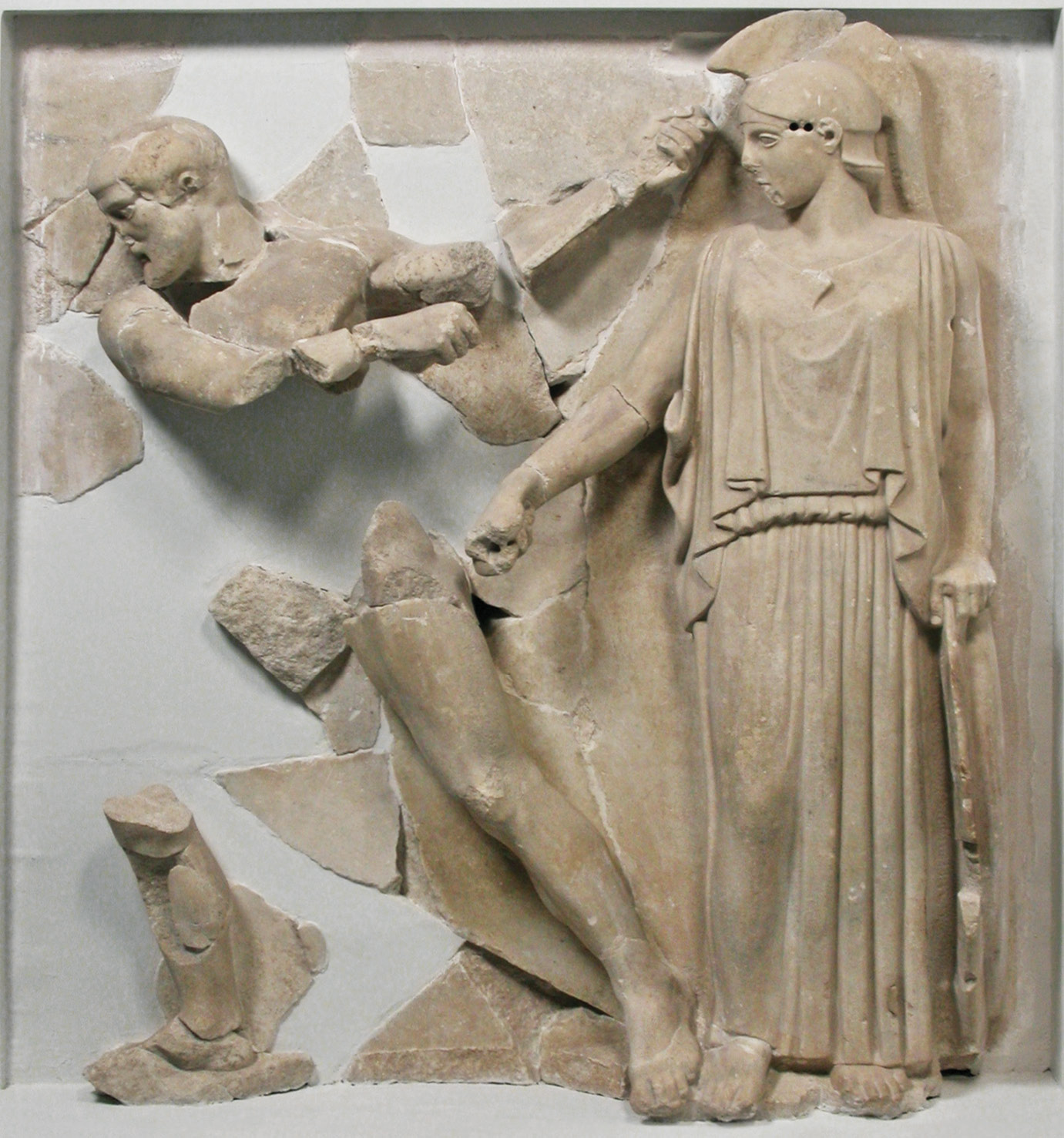 BELOW RIGHT One of the metopes from the Temple of Zeus showing the Labours of Heracles, on display at the Archaeological Museum of Olympia. Here the hero cleans the Augean stables.