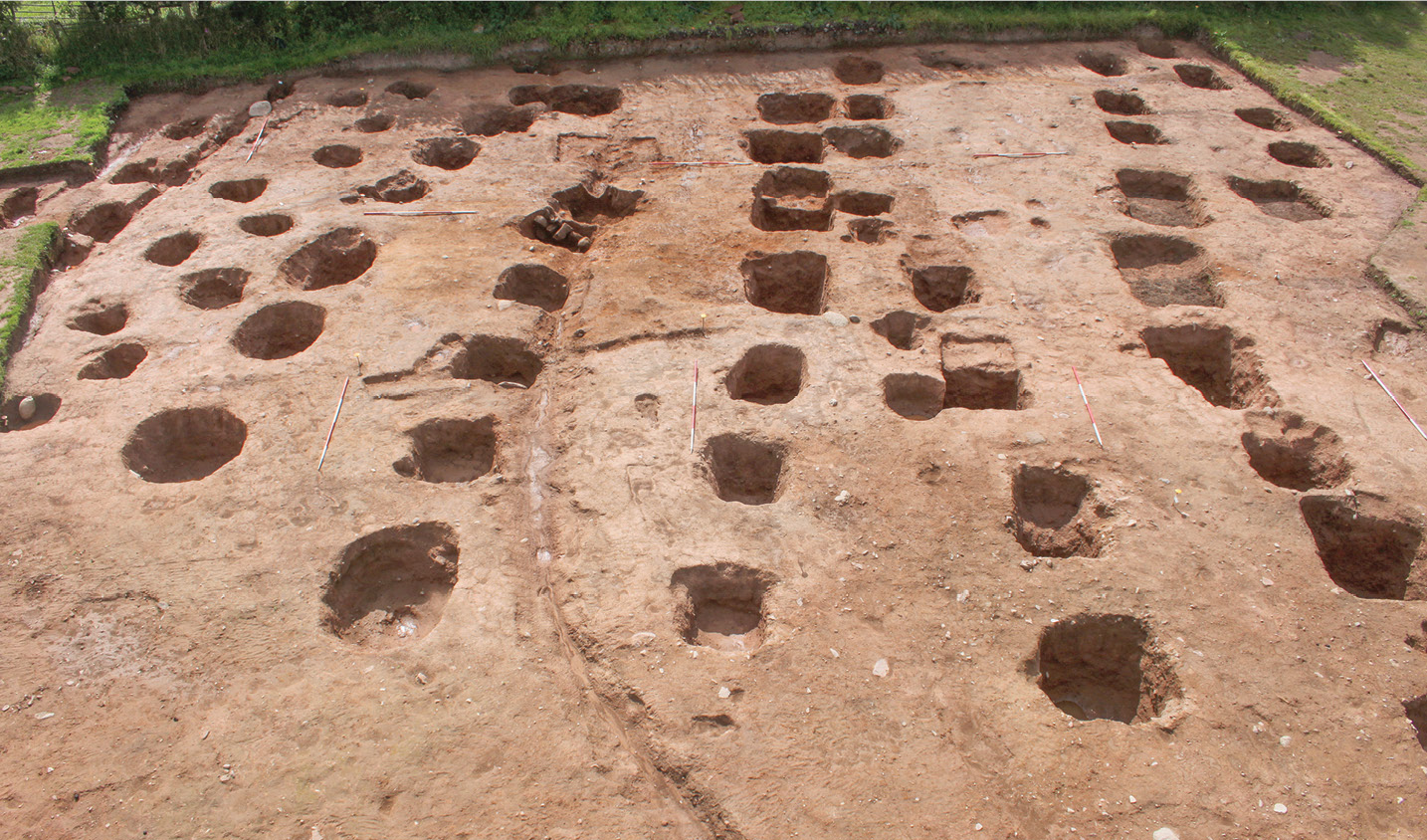 left The cluster of pits where the altars were found overlie a ring-ditch containing late 4th-century pottery, demonstrating that the altars were not buried until after this date.